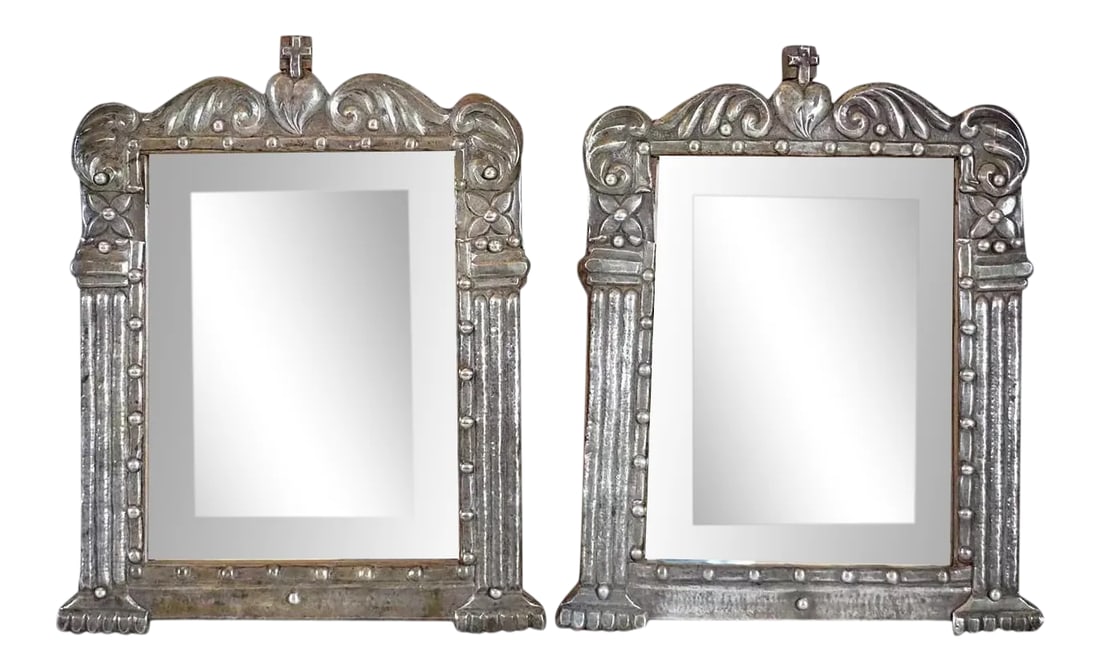 Indo-Portuguese Silver Framed Mirrors - A Pair: These beautiful, small, antique, 19th century Indian frames were hand carved of teakwood and overlaid with silver. Each features a central cross above a sacred heart, flanked by scrolls and floral