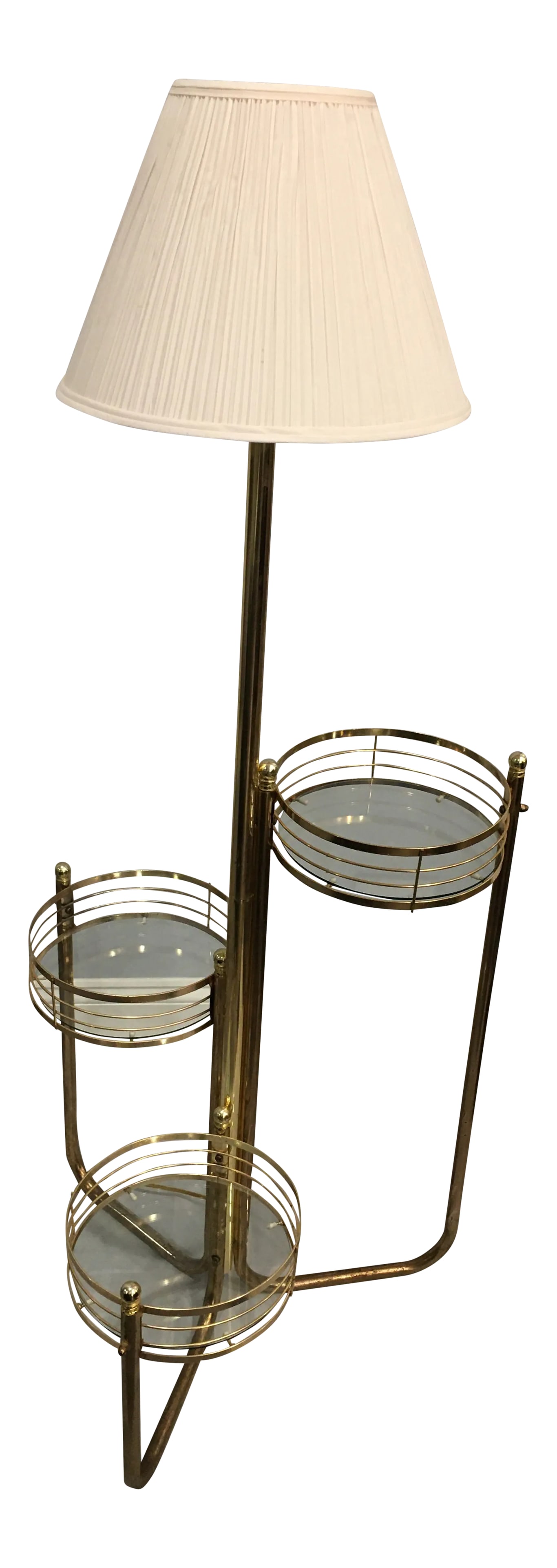 Vintage 1980s Brass & Glass Three Tier Plant Stand / Floor Lamp: This lamp is a great example of Hollywood Regency and provides three glass stands that would look fantastic staged with plants. Brass accent is very on-trend and would panache to any room. Condition: