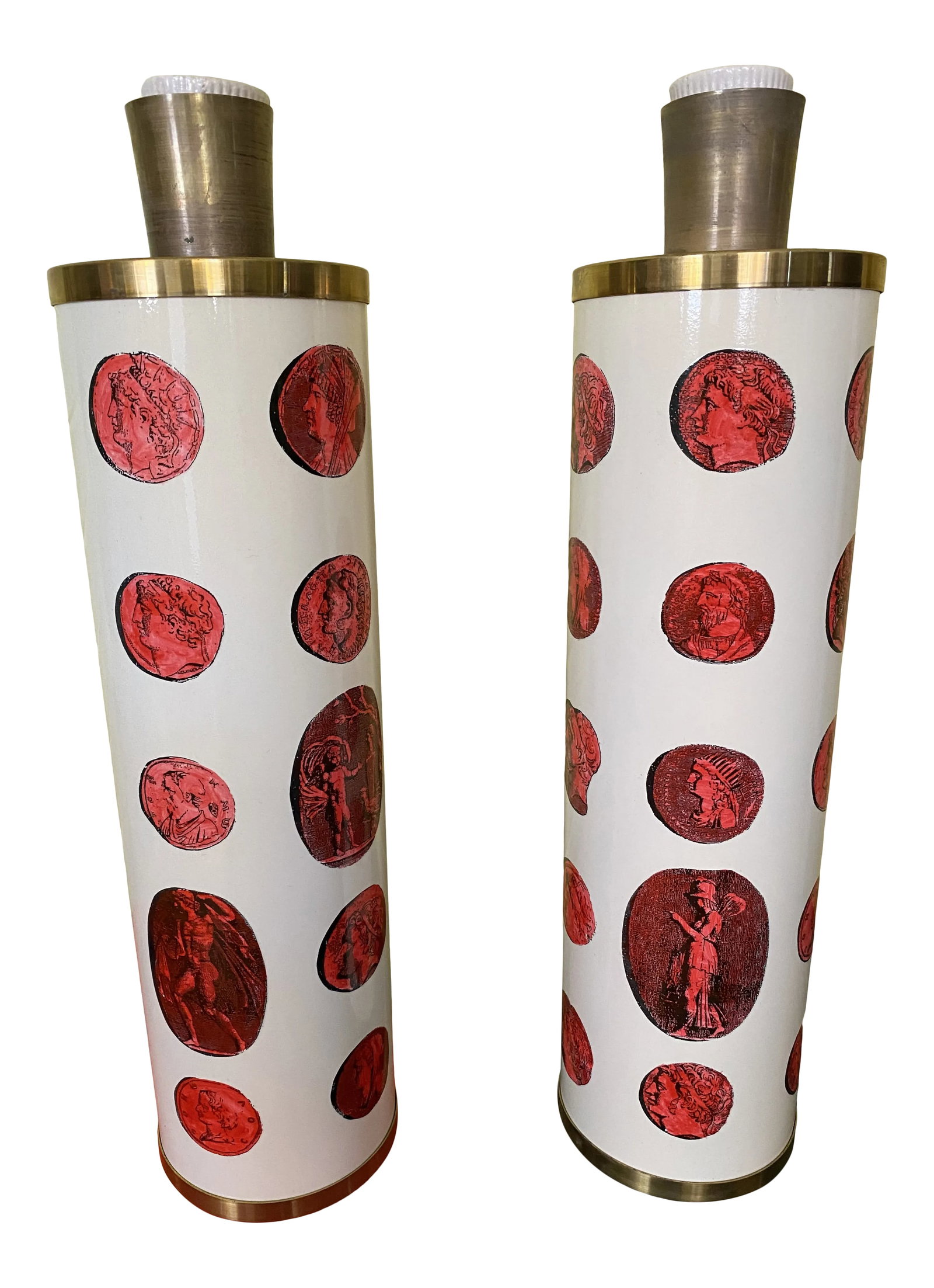 Piero Fornasetti Roman Coin Italian Table Lamps - a Pair: Fun pair of traditional Fornasetti red Roman Coin Italian table lamps. All sides pictured. The wiring is European, so you may want to convert to American. The red coins are on a white background. The