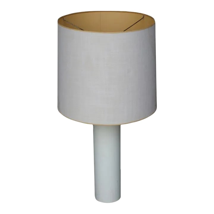 1960s George Kovacs White Leather Table Lamp: A mid century modern table lamp made by George Kovacs. A cylinder base wrapped in off-white leather with black trim. Condition: Alterations: Original Design Modified Imperfections: Some Imperfections 