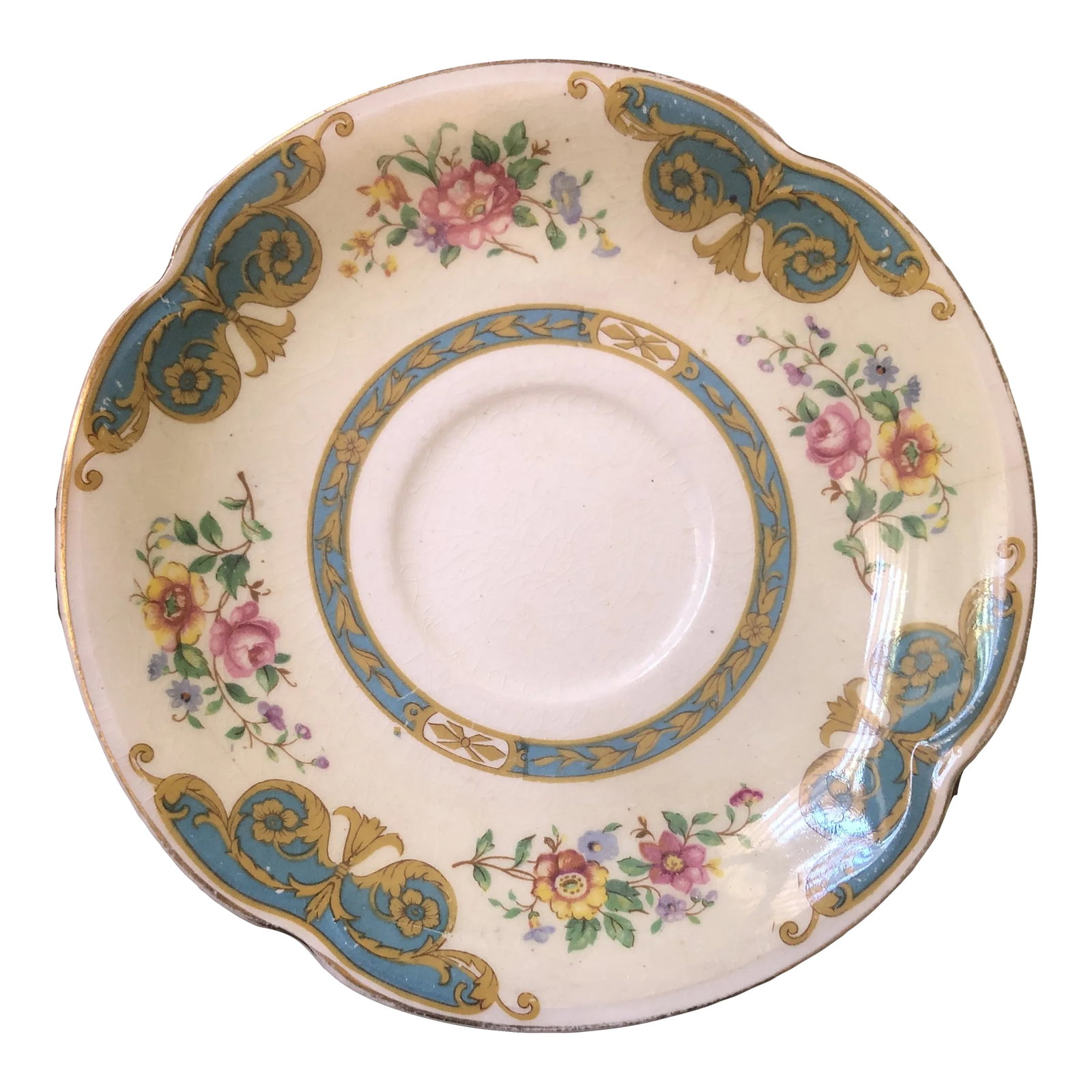1930's Johnson Brothers Pareek Belgravia Pattern: Rare piece and quite old . Saucer but I used it under a bud vase . The turquoise color is outstanding in this patterns as opposed to the other colors in other Pareek patterns. Scallops edges and adds 