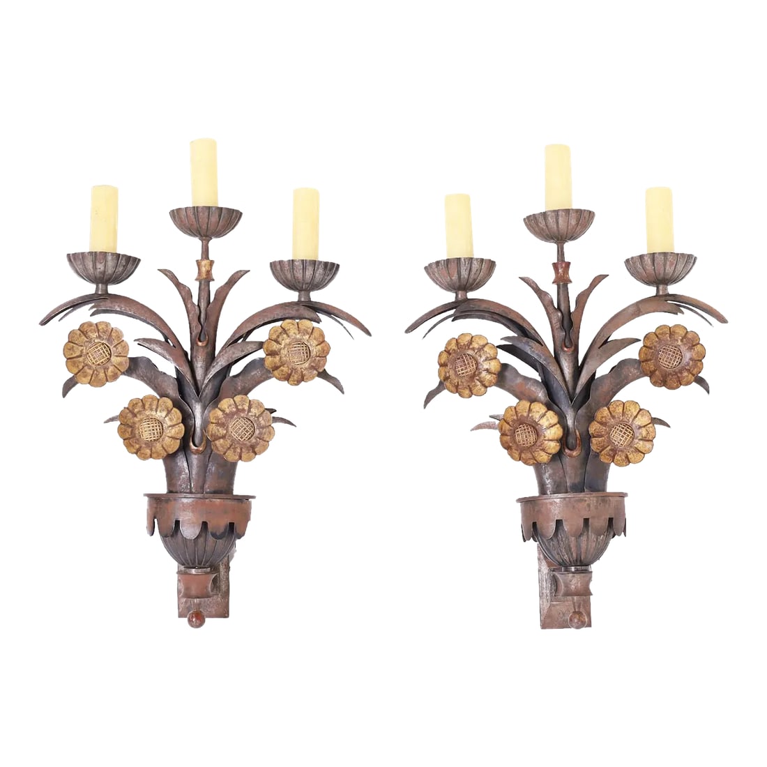 Pair of French Art Deco Floral Wall Sconces: Pair of French three light wall sconces crafted in steel and iron in a floral motif exploring early art deco influences mixed with industrial architecture, probably designed for a specific building. C