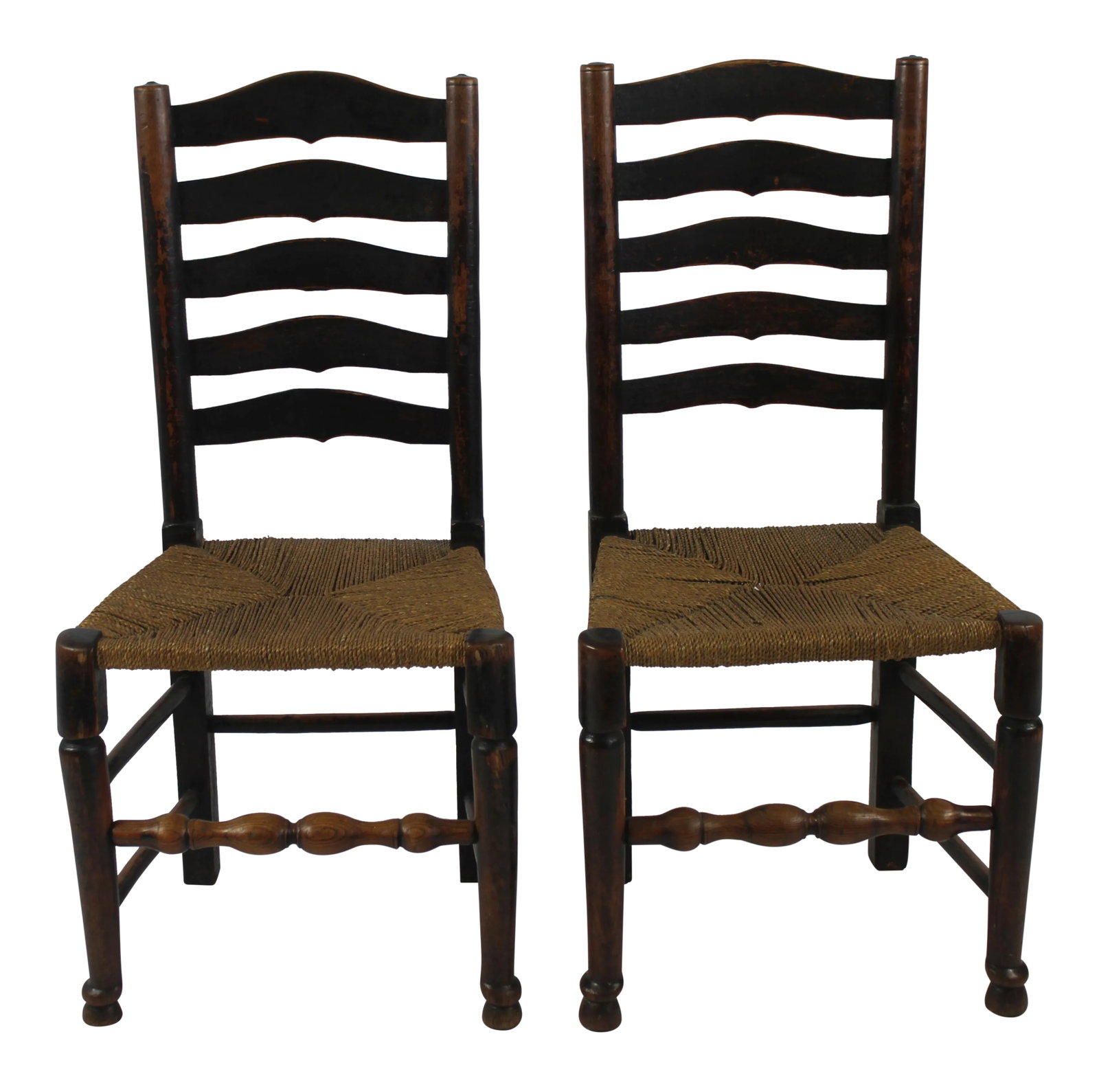 English Period Ladder Back Side Chairs- A Pair: English period side chairs with excellent patina. They are structurally sound and the seats are in very good condition. Era: Vintage; 1860's Condition: Very Good; age-appropriate wear PRODUCT