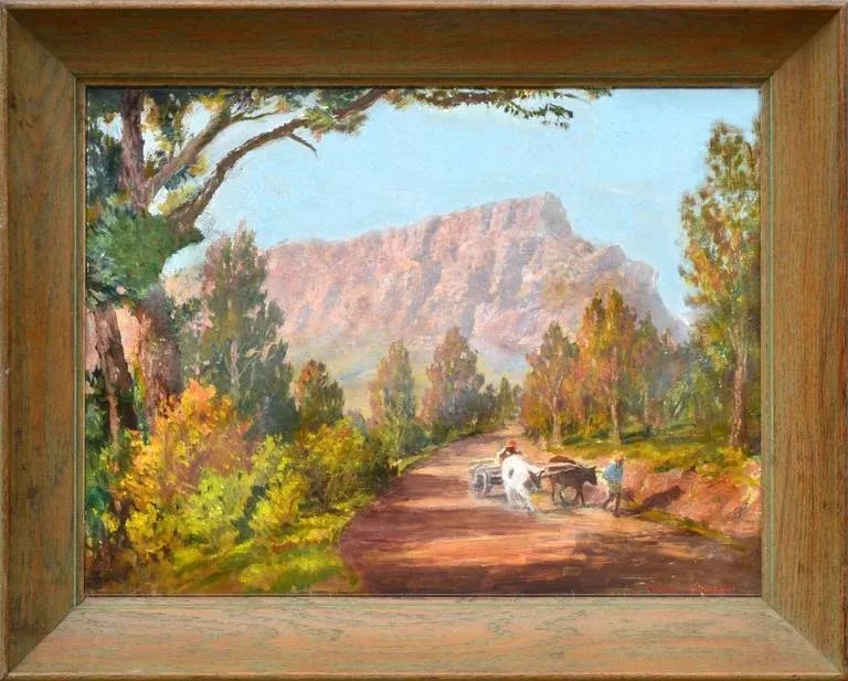 Mid 20th Century South African Mountain Landscape Oil Painting, Framed: Farmers guide a cart pulled by cows along a dirt path, a majestic mountain is their backdrop; a scene from South Africa. Signed "Victor Simmonds" lower right. Victor Simmonds was a Landscape artist