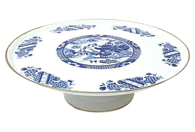 Chinoiserie Limoges Porcelain Cake Plate: Vintage French Limoges porcelain cake plate with an Asian temple and garden scene in the center. Patterned graphic shield and floral accents. Gilt edge accenting. Marked "Porcelaine, Limoges, Made In