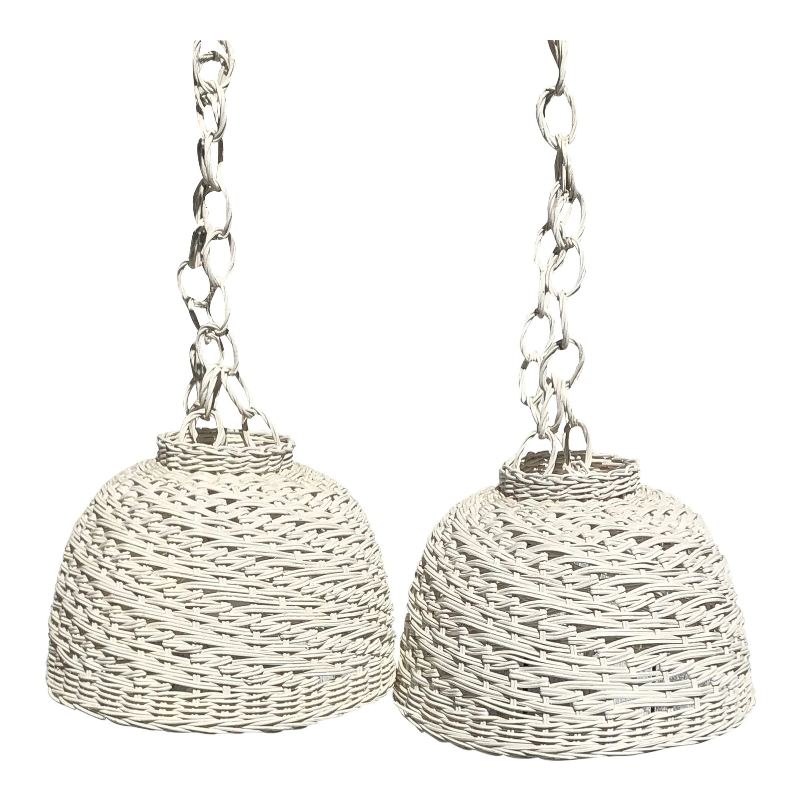 Vintage 1970s White Wicker Pendant Lamp Pair: Vintage pair of hanging white wicker pendant lamps with wall brackets and wicker chains. Circa 1970's. Condition: Alterations: Original Condition Unaltered Imperfections: Some Imperfections Condition 