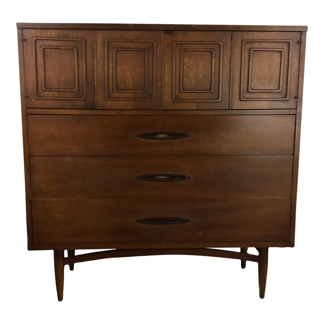 Mid Century Modern Broyhill Sculpture Highboy Dresser: This mid century modern highboy dresser from the Sculptra line by Broyhill features hardwood construction, walnut veneer with original finish, three dovetailed drawers with signature inlaid pull, two
