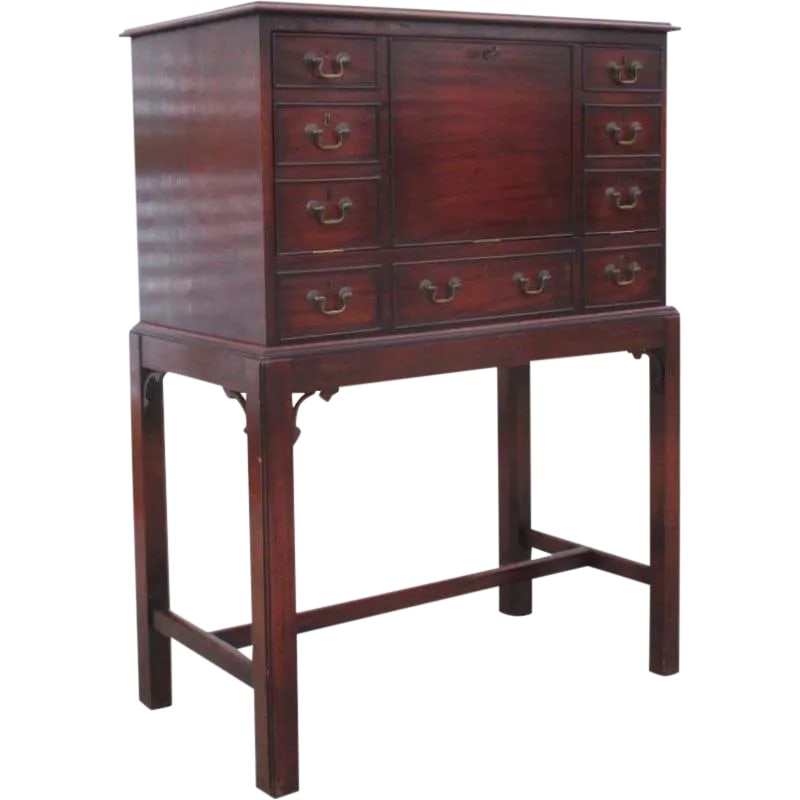 English Antique Drop Front Writing Desk: Lovely english antique drop front writing desk, c. 1900. This beautiful example of english craftsmanship is made of solid mahogany, with faux drawers decorated with original english hardware pulls.