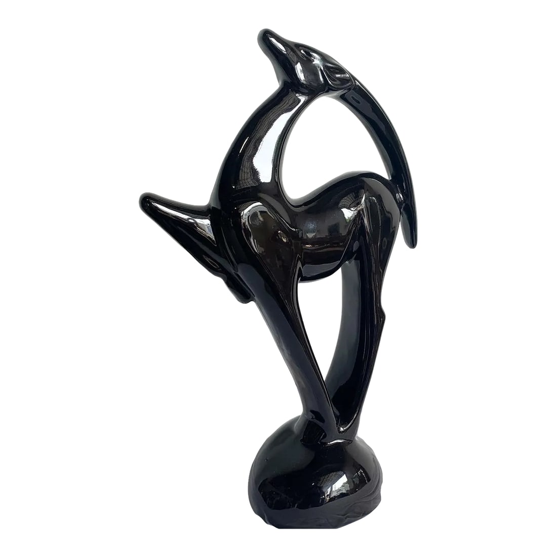 Postmodern Black Ceramic Ibex Sculpture by Haeger: This Postmodern Ibex sculpture by Haeger ceramics seamlessly blends traditional form with contemporary design. Molded in a deep black ceramic, its bold silhouette and stylized features capture the