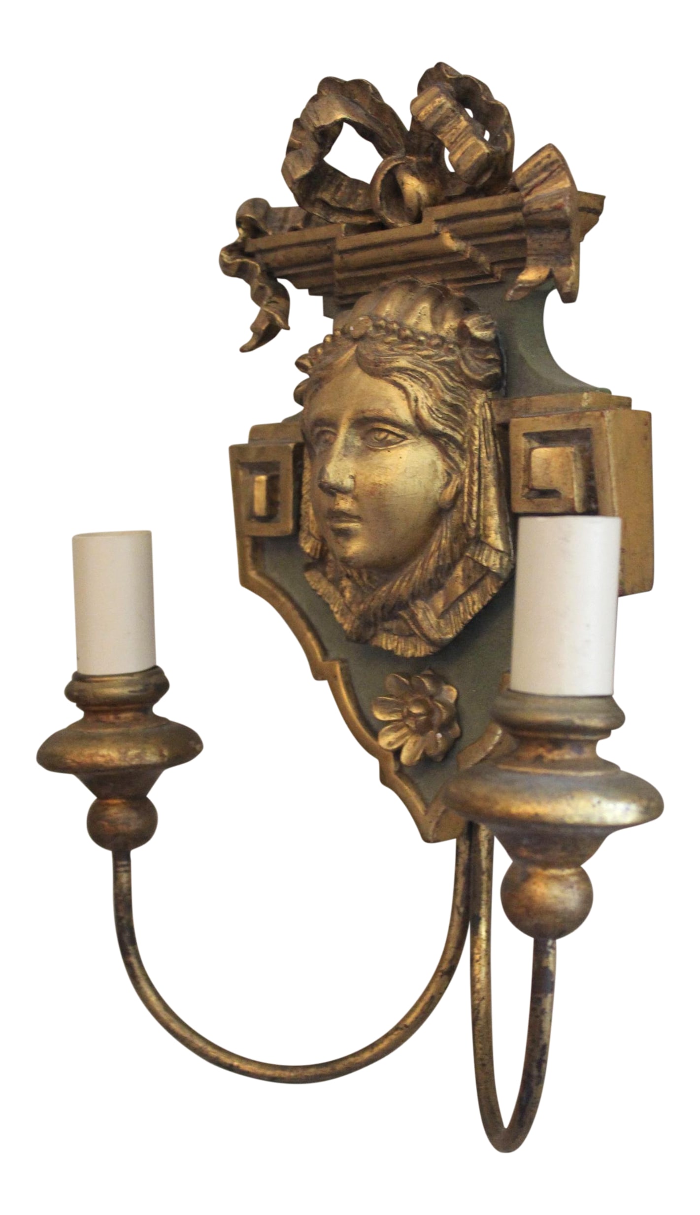 20th Century Neoclassical Wooden Double-Arm Sconce: Neoclassical carved-wood sconce with a face of a woman and a bow. Celadon green with gilded accents, the piece has a very "Versace" effect. Purchased in Capri, Italy, and not wired for US. Condition: