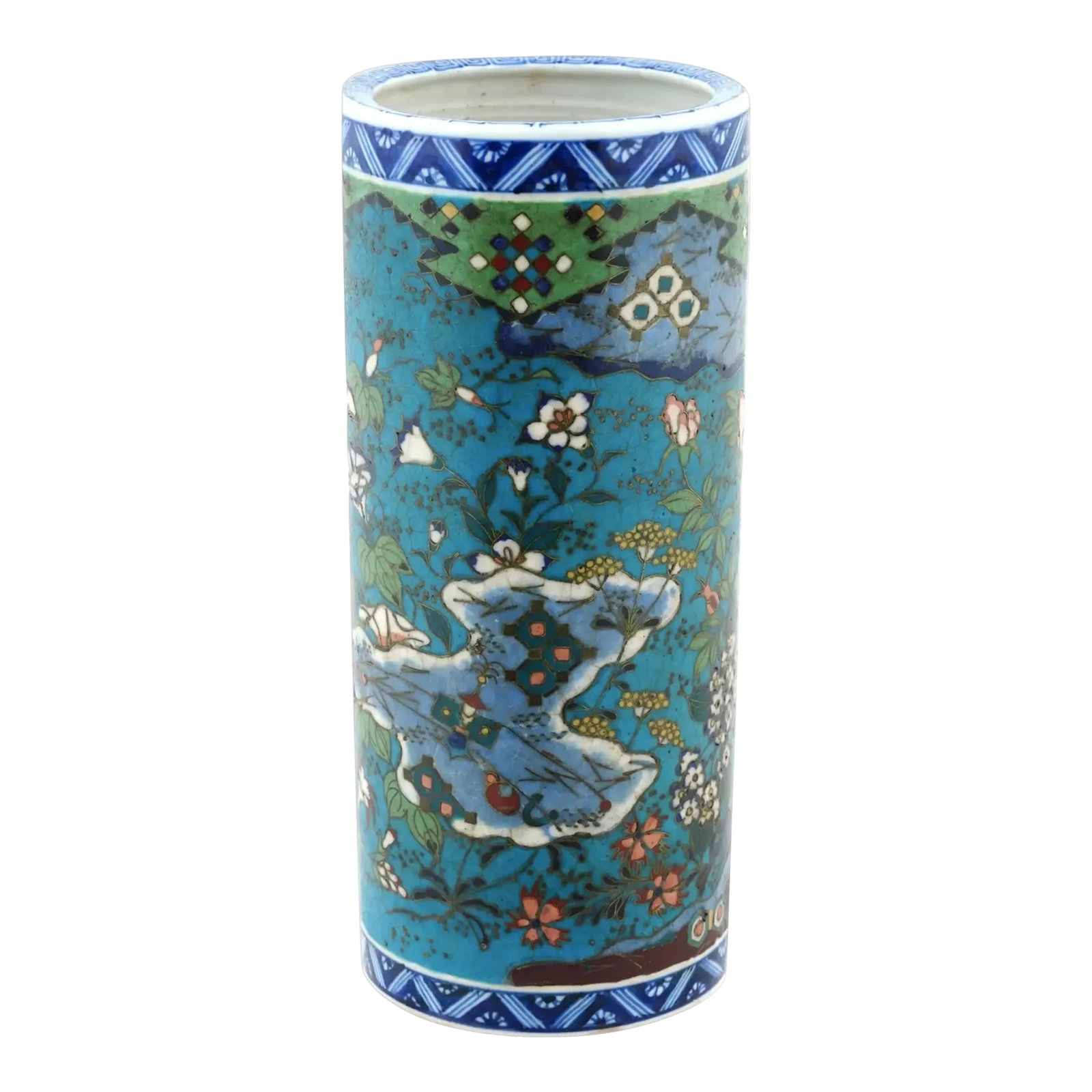 Antique Japanese Cloisonne Enamel on Porcelain Floral Vase: An antique Japanese porcelain vase with polychrome design. Meiji period, circa 1870 Cylinder shape. Hand-painted blue and white patterned rims. Floral and geometrical cloisonne enamel ornaments in
