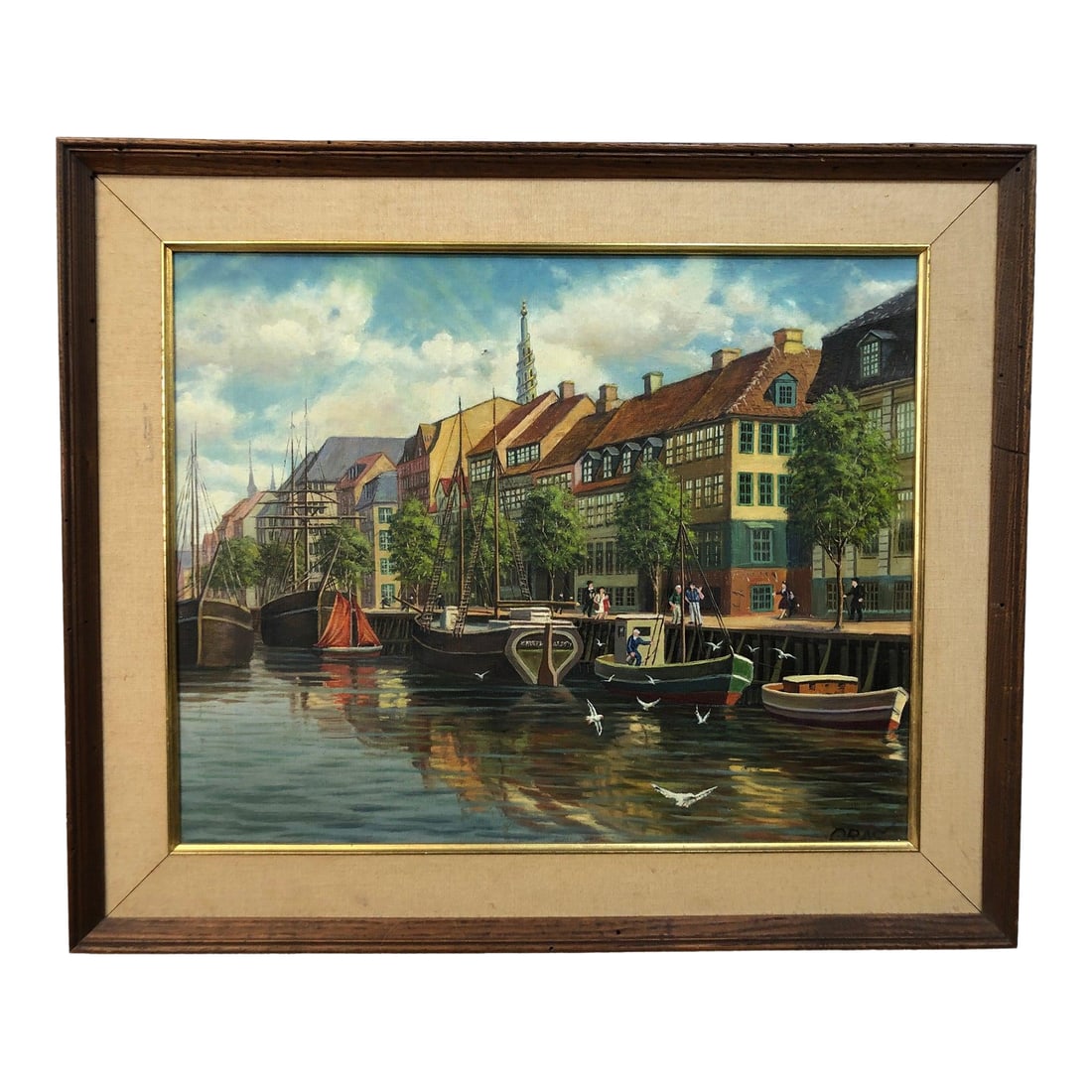 "Harbor Days in Old Europe" - Mid 20th Century Original Oil on Canvas Signed on the Bottom, Framed: This captivating original oil on canvas, signed in the lower right corner, presents a charming European port city bustling with color, reflection, and old-world elegance. The painting belongs to the
