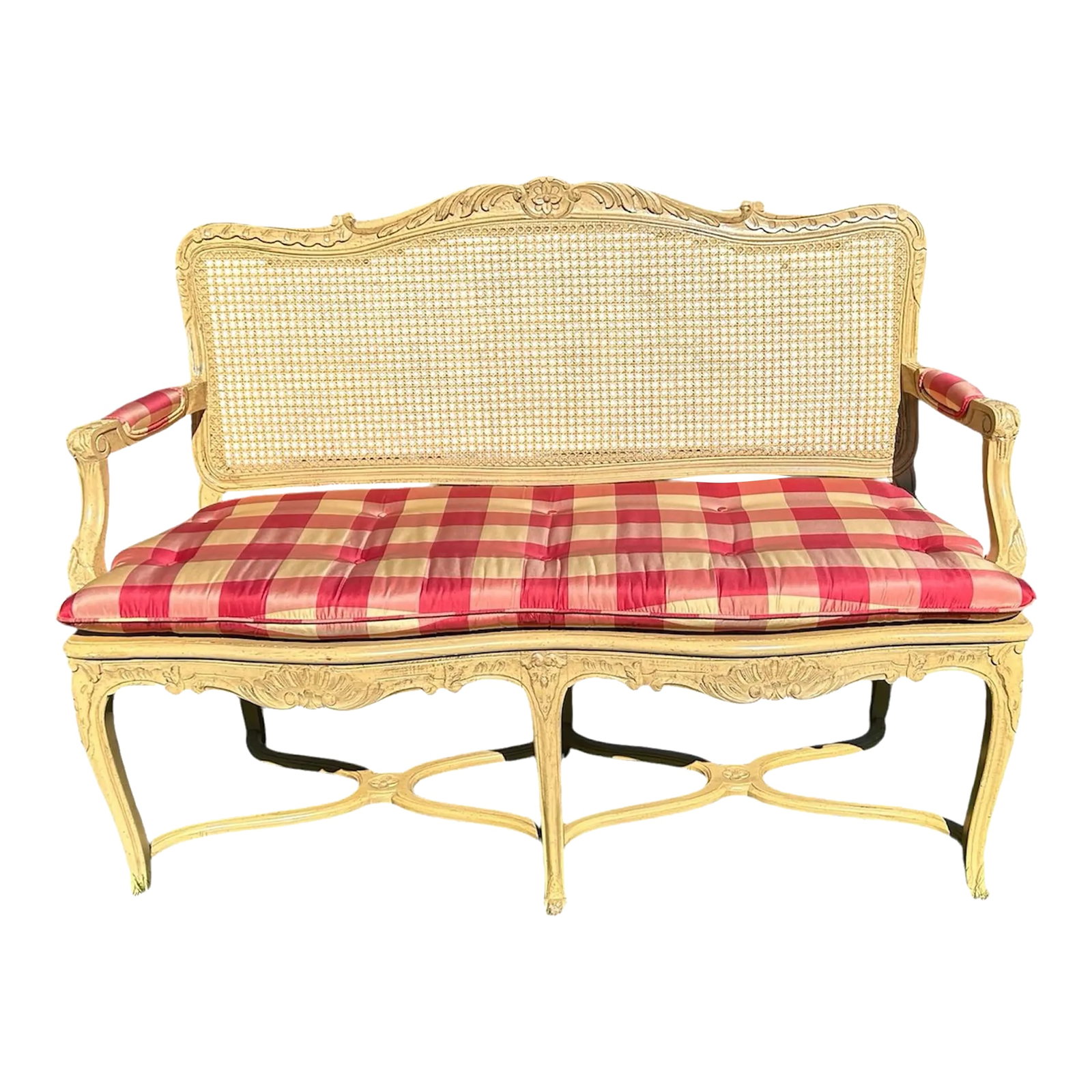 Vintage Cane Bench: Gorgeous French provincial caned settee. It has upholstered arms and seat cushion in pink and cream silk check fabric. It came out of an estate in Greenspring Valley, MD. It's in near perfect