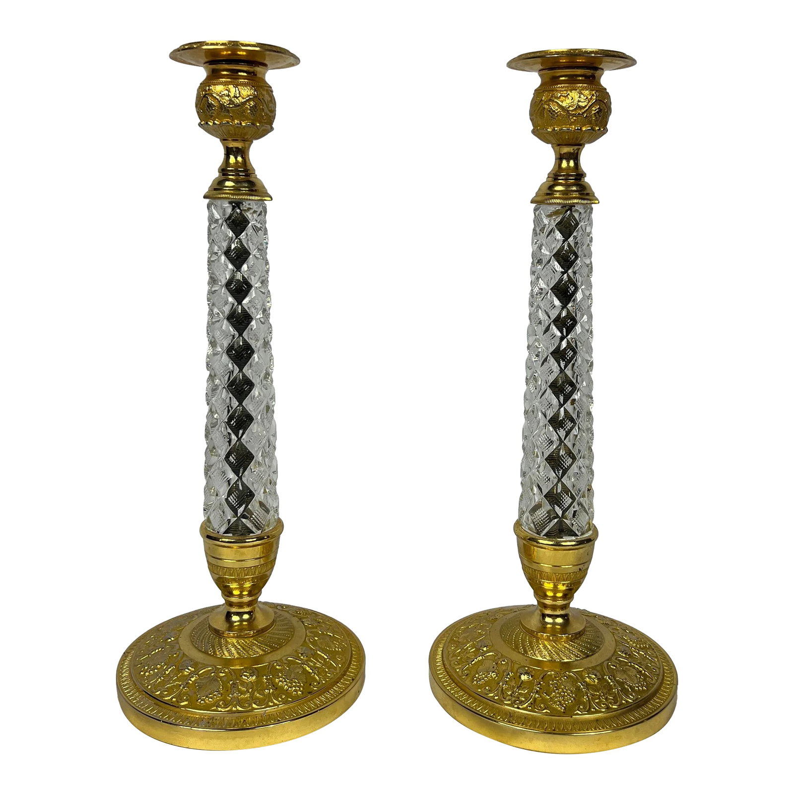 Pair, 19th Century Charles X Gilt Bronze & Crystal Candlesticks: This exquisite pair of Charles X candlesticks exemplifies the refinement and opulence of early 19th-century French design. Crafted during the reign of Charles X (1824-1830), these candlesticks are a h