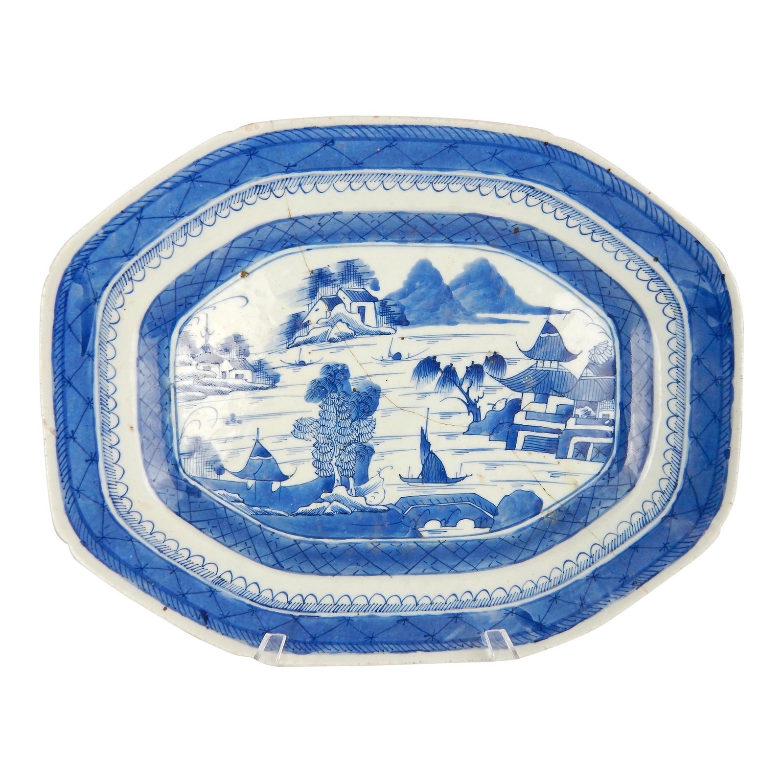 Late 18th - Early 19th Century Canton Platter With Old Staple Repairs: Late 18th - Early 19th Century Canton blue and white platter with old staple repairs. Central panel features a lovely classic landscape scene with multiple houses surrounding water, a boat, bridges