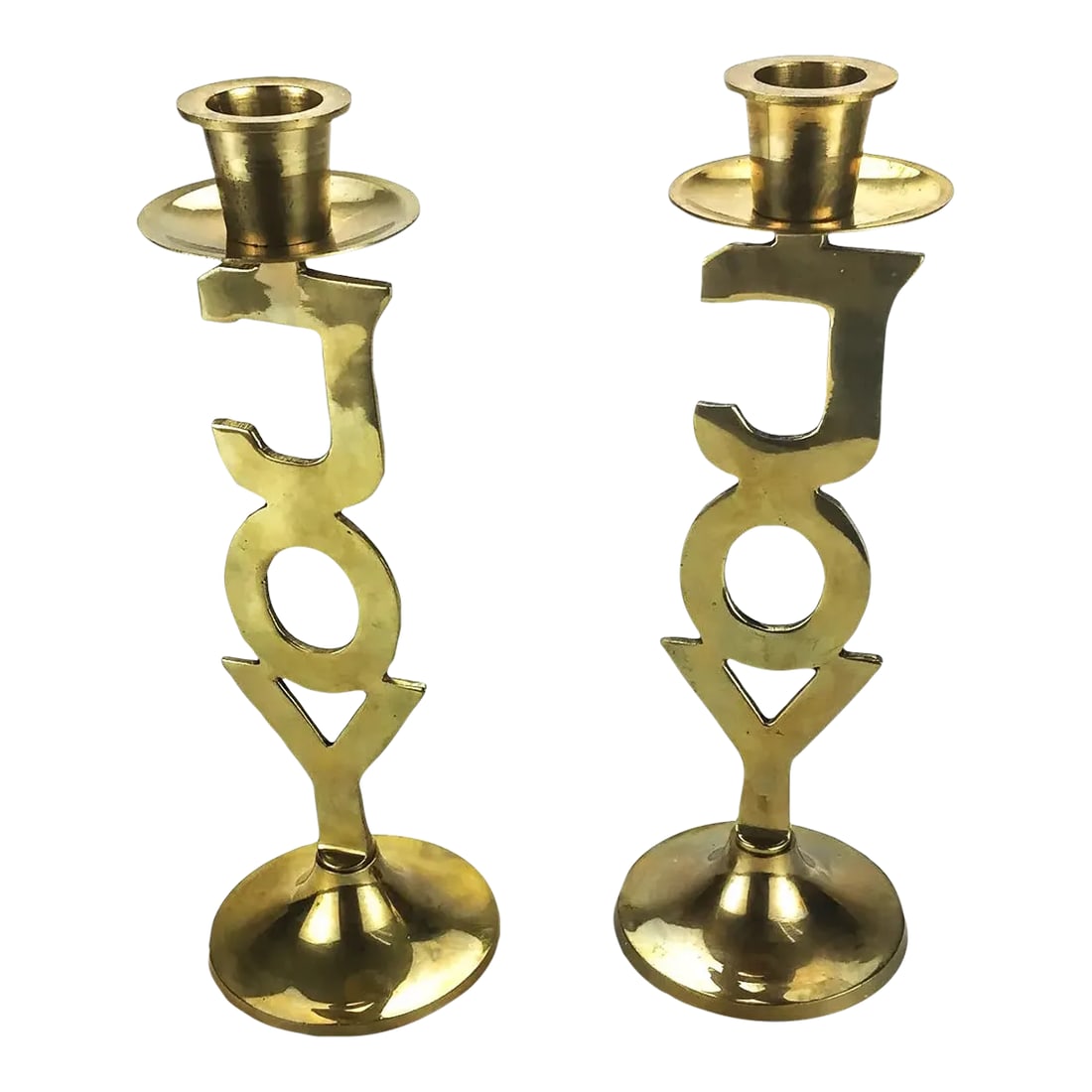 Solid Brass Pair of Joy Motif Candleholders MCM: Just in time for the festive season. Adorn your table with this vintage pair of solid brass candle holders. These have been well taken care of and are in wonderful condition with a slight patina