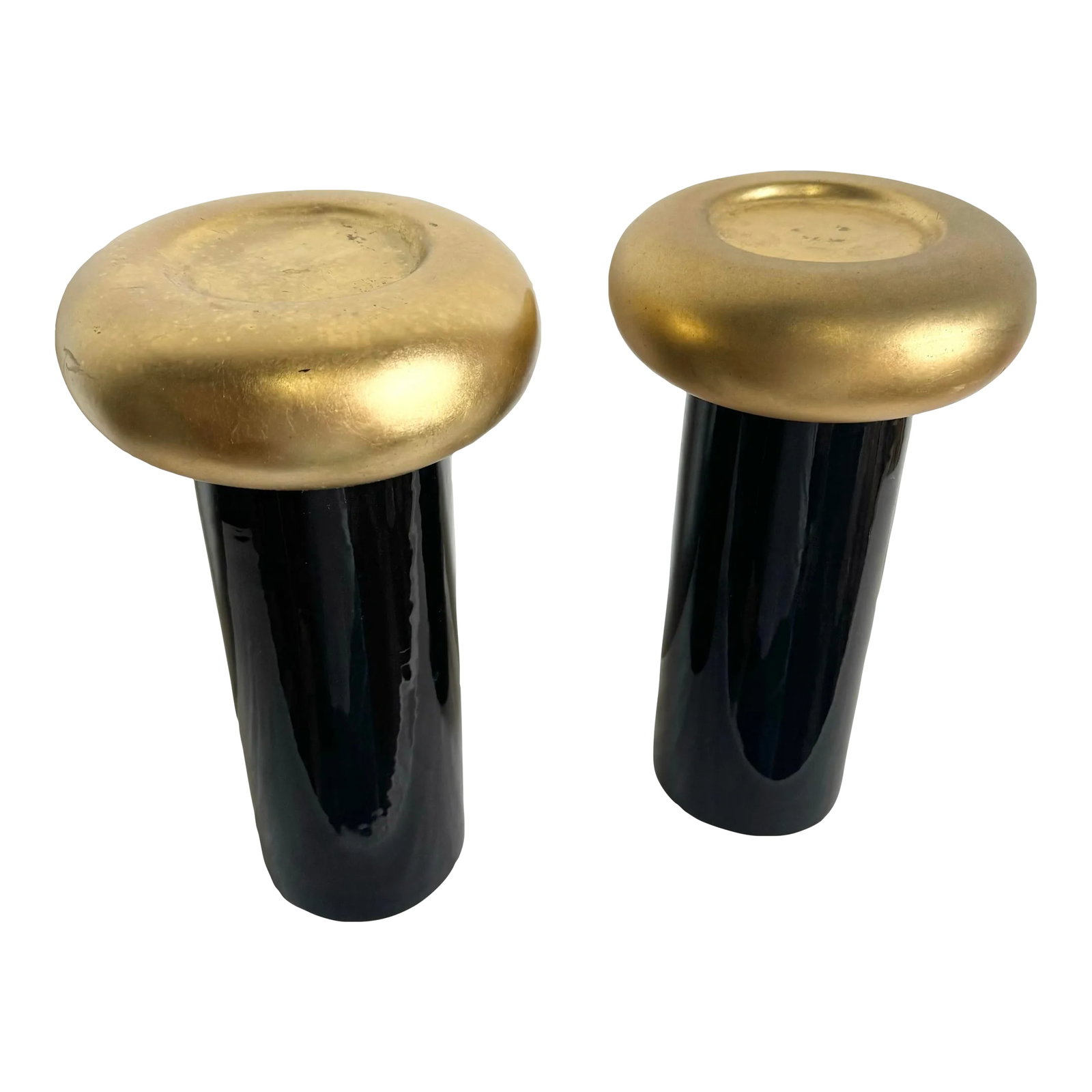 Postmodern Black and Gold Ceramic Candle Holders by Jaru: Make a bold statement with this striking pair of postmodern ceramic candle holders by Jaru. Featuring a sleek black cylindrical base topped with a lustrous gold metallic dome, these pieces embody the