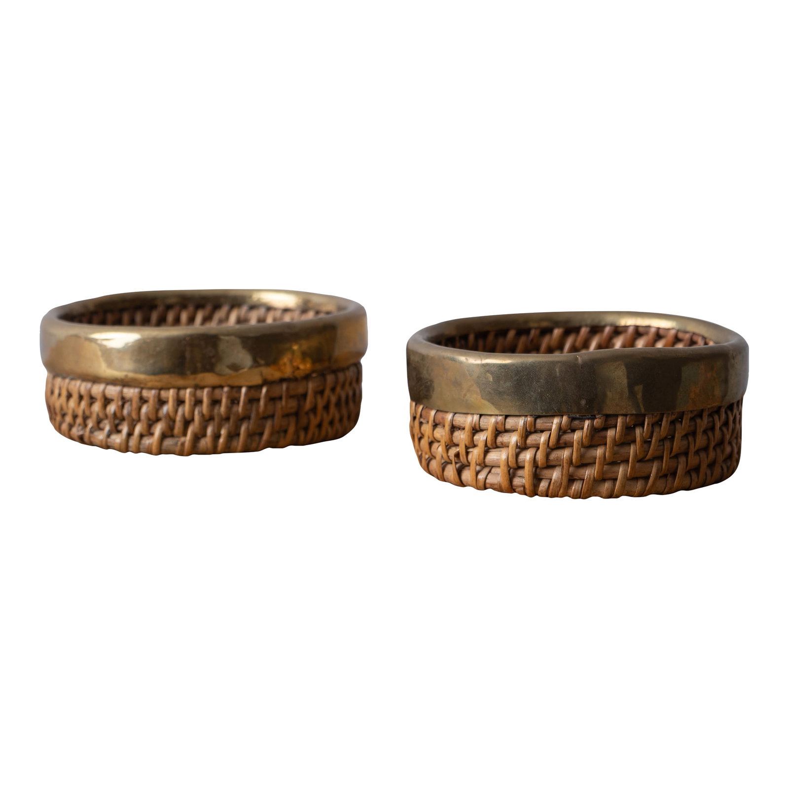 Crespi Style Pencil Reed Baskets, 1960s: A pair of Crespi style pencil reed and brass baskets - coasters or catch-alls, 1960s. 5 1/2 inches wide by 2 inches tall Condition: Alterations: Original Condition Unaltered Imperfections: Some