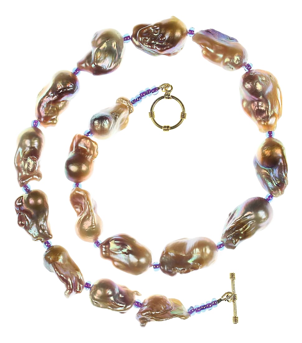 21 Inch Striking Natural Color Baroque Pearl Necklace: Natural Color Baroque Pearl Necklace A stunning and elegant necklace featuring lustrous baroque pearls in natural hues of purple and gold, complemented by exquisite Czech beads and a gold-plated