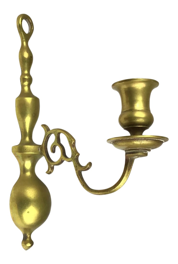 Georgian 18th Century Brass Wall Sconce: Purchased from a brocant in France during the 80s, this beauty has been stored away for decades. Stable and straight, it will hold nicely a single candle. Very heavy for the size with a gorgeous