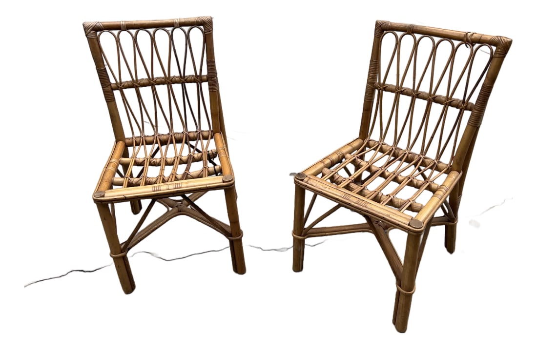 1970s Pair of Boho Chic Rattan Detailed Side Chairs: Up for consideration is a beautiful vintage pair of rattan boho chic chairs. These would look lovely in your home and they are a great conversation starter for guests. These are also perfect for the i