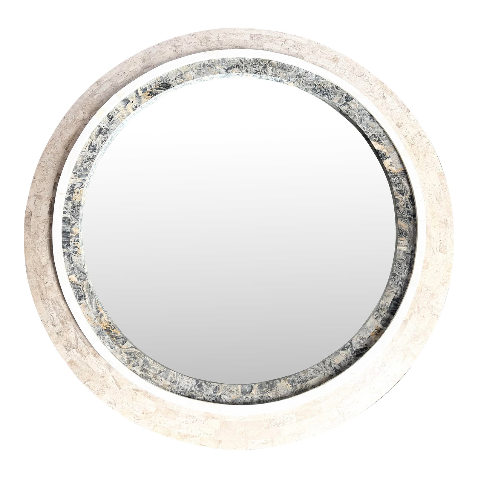 Postmodern Grey White and Tan Tessellated Stone Circular Wall Mirror: This postmodern circular wall mirror makes a bold statement with its sculptural design and natural materials. The wide tessellated stone frame showcases tones of grey, white, and tan, arranged in a