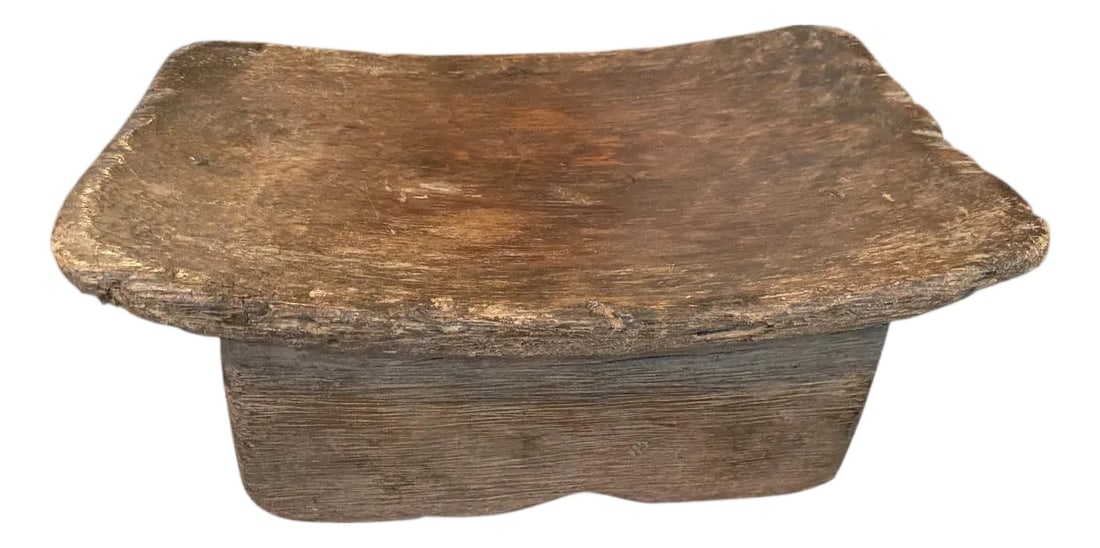 Antique Wood African Stool: Lovely patina on this beautiful African stool hand carved from a single piece of wood. Great for placing a book or perhaps towels in a bathroom, magazines etc. This stool was sourced in the spirit of 