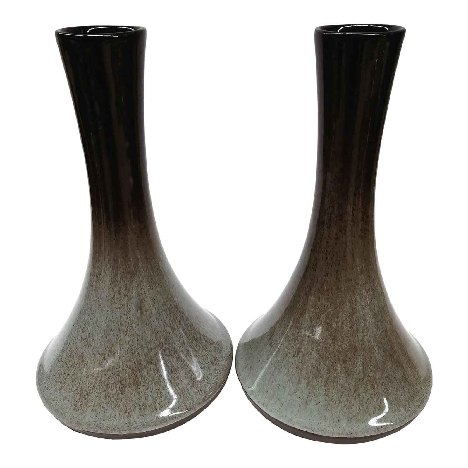 Artisan Mottled Ceramic Vases- A Pair: Despite being crafted in 1981, the shape of these artisan vases is so Mid-century chic! Designed by Peter Pots, a wonderful potter who has had his art displayed all over the world. Works such as these