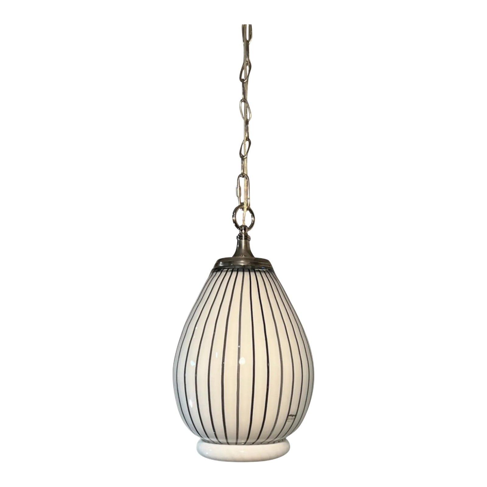 Vintage Murano Striscia Art Glass White Oval Pendant Light With Black Stripes: This one-of-a-kind Murano art glass piece was created exclusively for the high-end CasaBique company in the 1970s, during a period when CasaBique collaborated with respected Murano glass artisans and