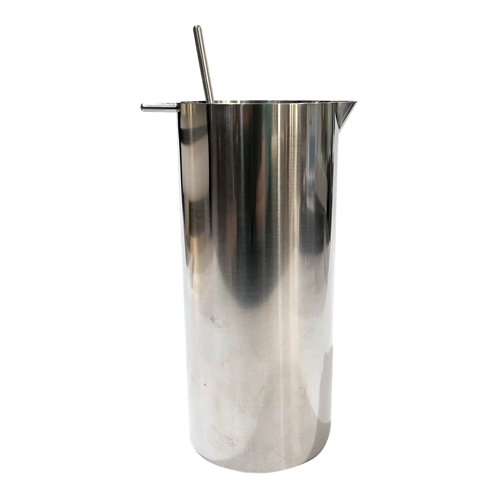 Late 20th Century Stelton Cylinda Martini Mixer With Stirrer Spoon by Arne Jacobsen: Unique yet useful Cylinda Series A.J. Martini Mixer pitcher. A Danish modern classic designed in 1967 by the renowned Arne Jacobson. Constructed of sold brushed 18/8 stainless steel. Includes removabl