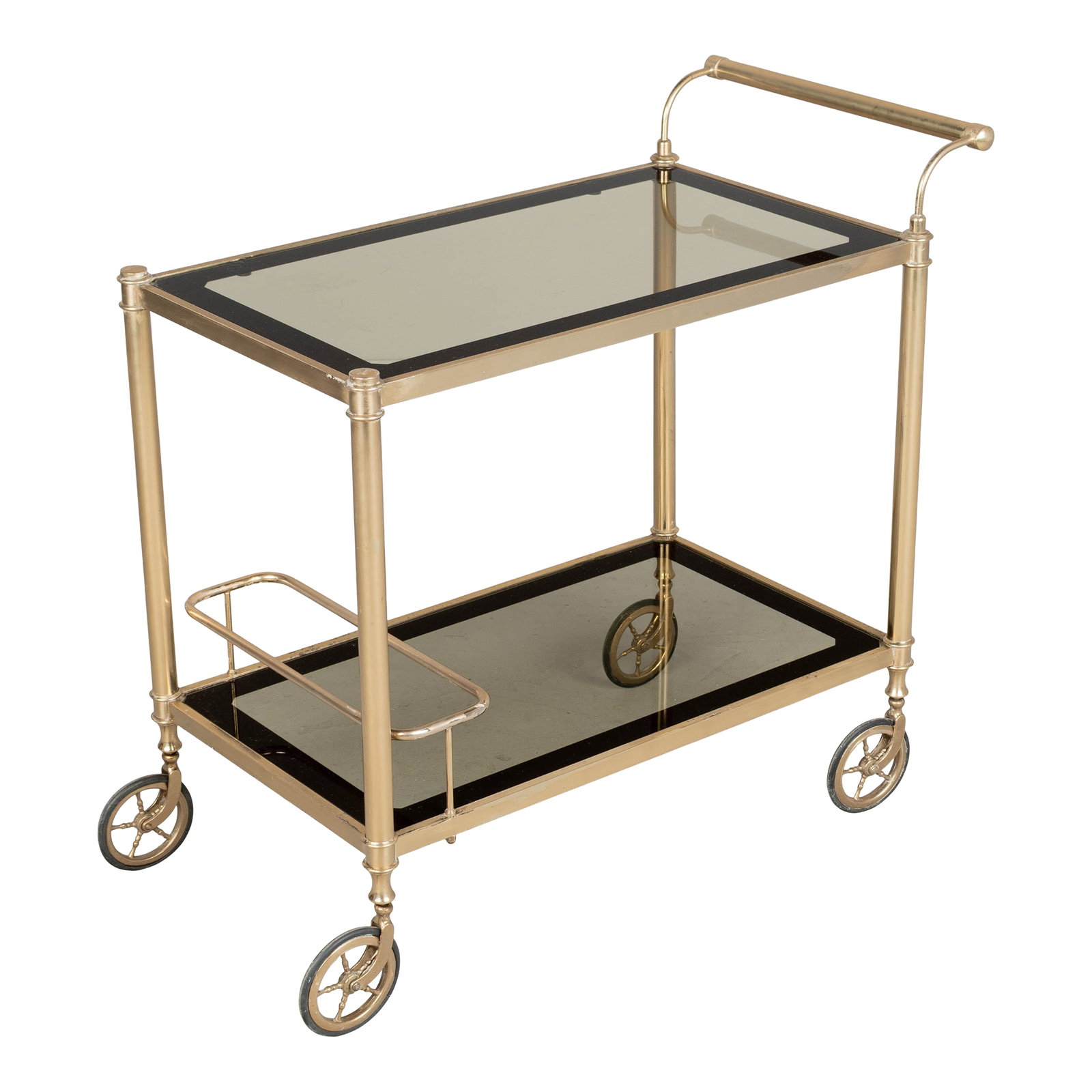 Italian Brass Bar Cart With Smoked Glass Shelves 1970s: An Italian Hollywood Regency style brass plated bar cart. Smoked glass shelves with dark paned border. Simple bar handle. Bottle rack on the lower shelf. Wheels run smoothly. In good condition with mi