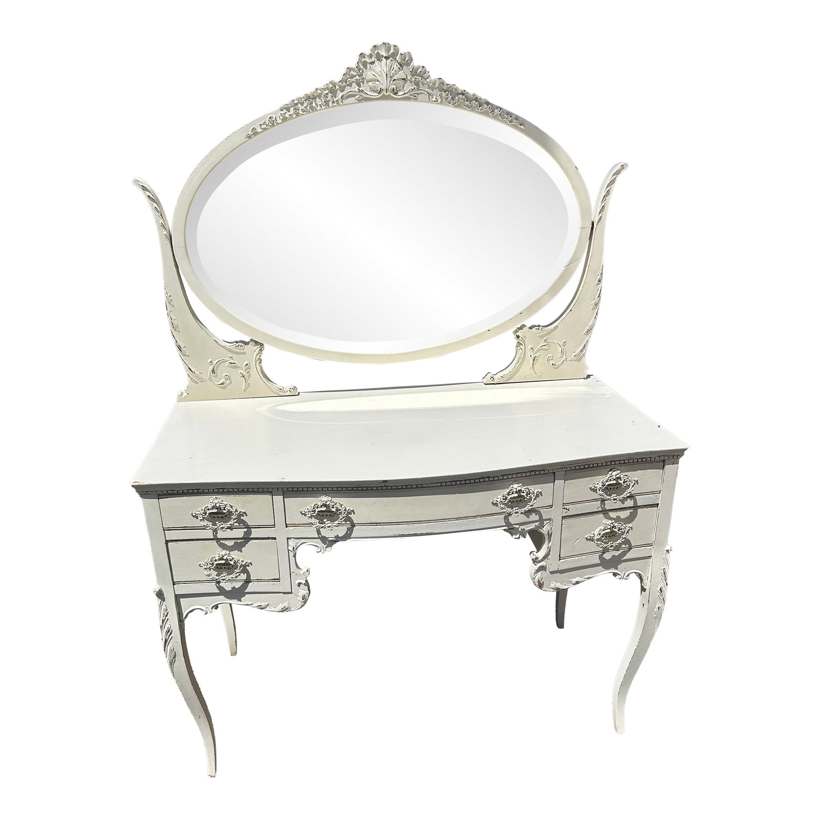 Charming White Painted Wood Vanity With Oval Mirror: Lovely white painted vintage French style vanity having cabriole legs, 5 drawers for storage, and a pretty large oval mirror. Overall height with mirror 59.5 Mirror measures 35 x 21 29.75 h to