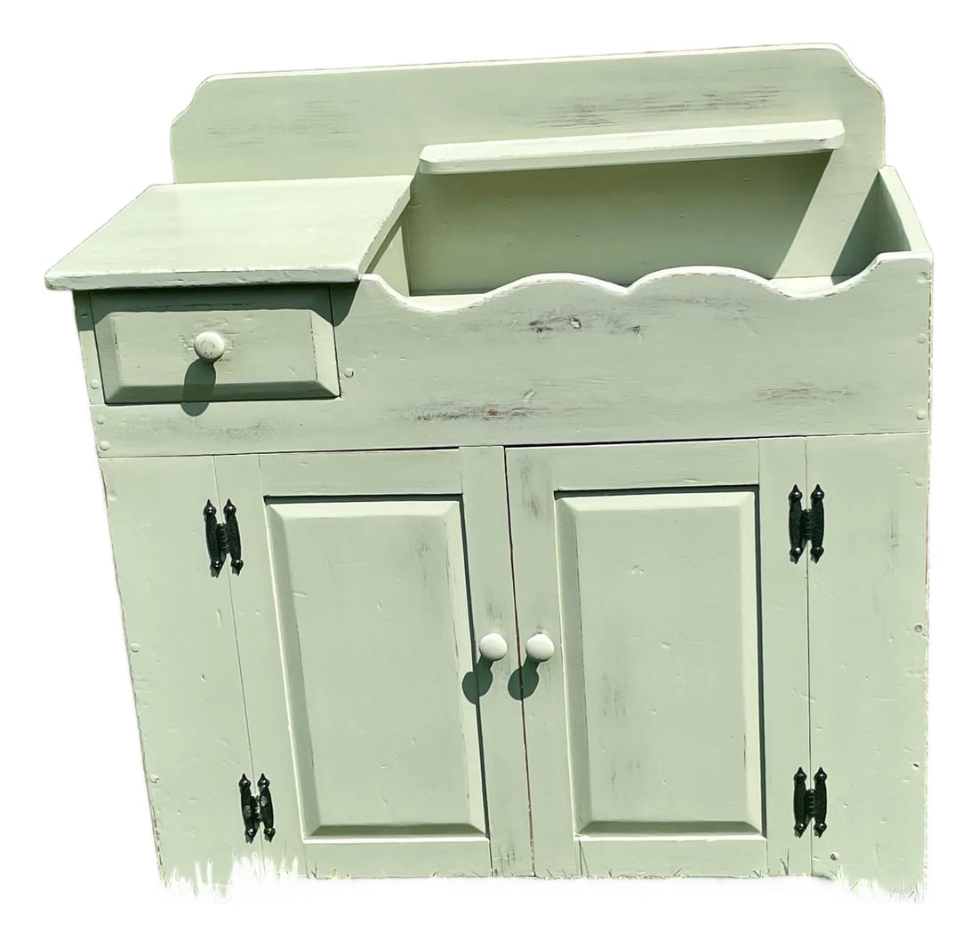 Restored Mid-Century Country Style Sage Green Dry Sink: This beautifully restored vintage Pennsylvania style dry sink infuses authentic country farmhouse character directly into modern interiors. Expertly refinished in a striking sage green palette, this v