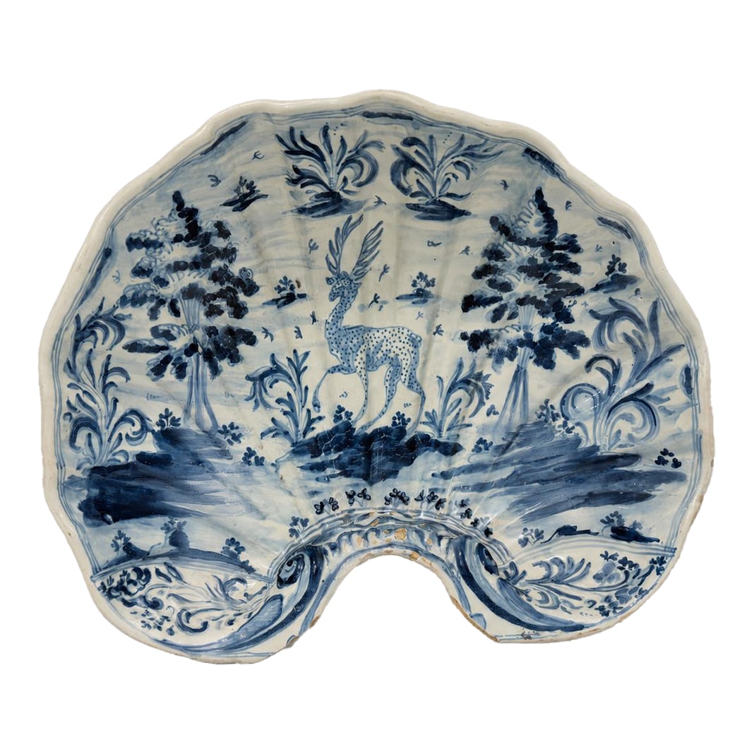 Spanish Tin-Glazed Shell-Form Basin Attr: Puente Del Arzobispo, Toledo 1790-1830: Spanish Blue-and-White Tin-Glazed Earthenware Shell-Form Basin, Attributed to Puente del Arzobispo, Toledo, within the Talavera-Puente Ceramic Tradition, circa 1790-1830 An unusually sculptural