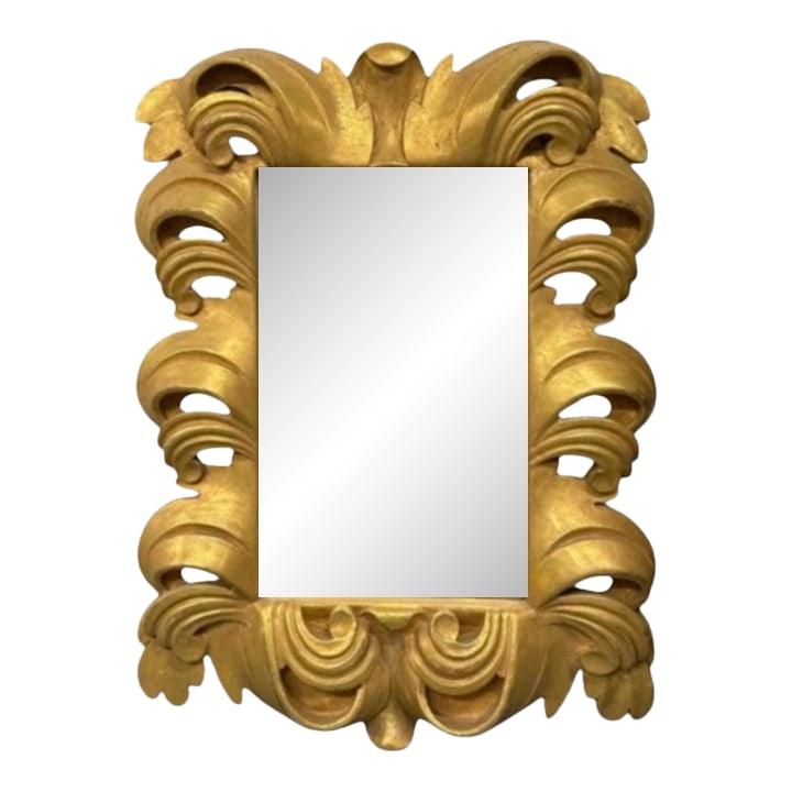 Late 20th Century Ornate Gold Leaf Carved Mirror: Ornate gold leaf carved mirror with Rocco-inspired motifs. Condition: Alterations: Original Condition Unaltered Imperfections: Some Imperfections Condition Notes: Good condition. a few flasws from