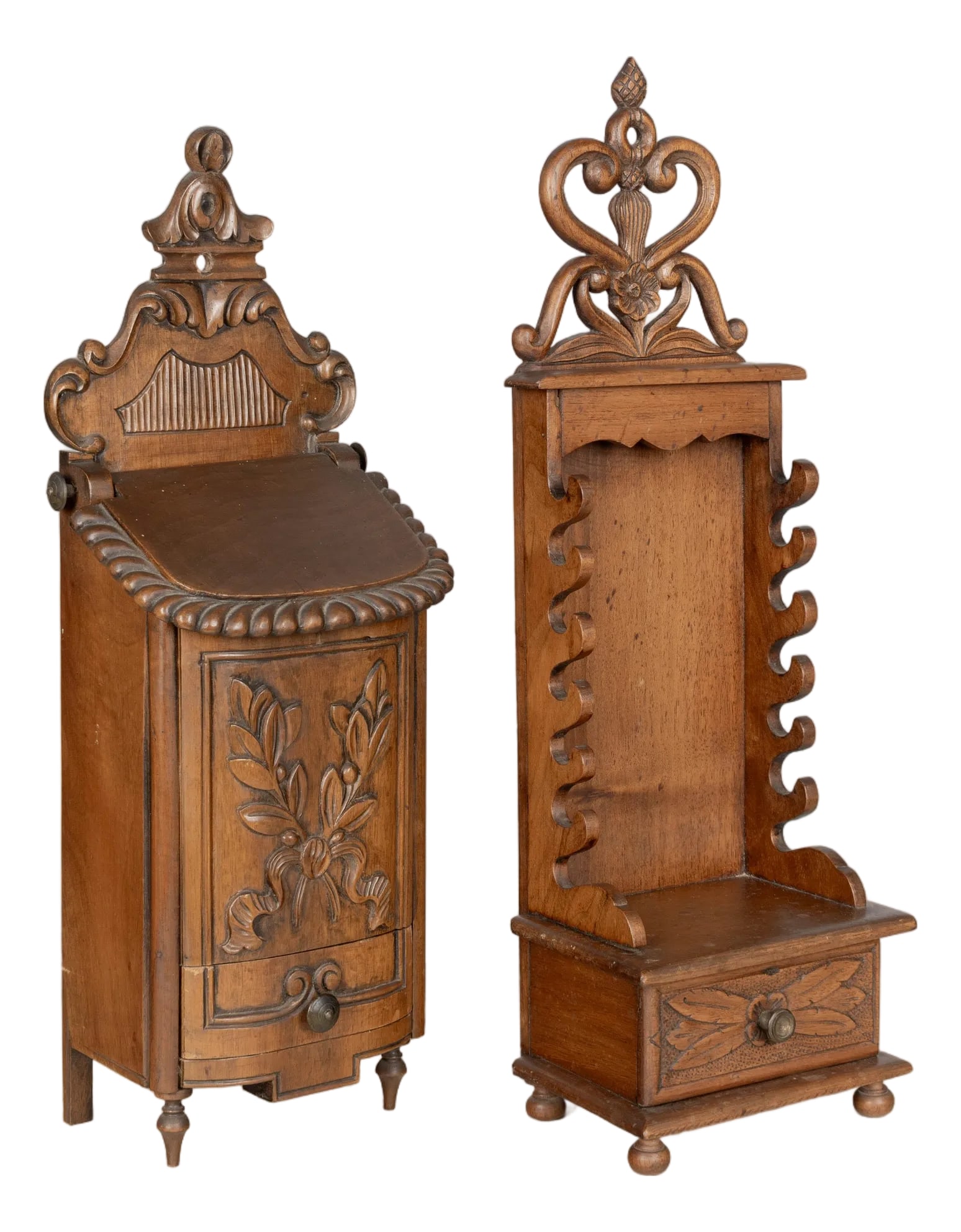 French Provencal Walnut Boxes, Set of 2: A set of two French Provencal decorative boxes including a porte-couteaux, or knife rack, and a boite a sel, or salt box. Each made of walnut with fine hand-carved decoration. Waxed patina. These