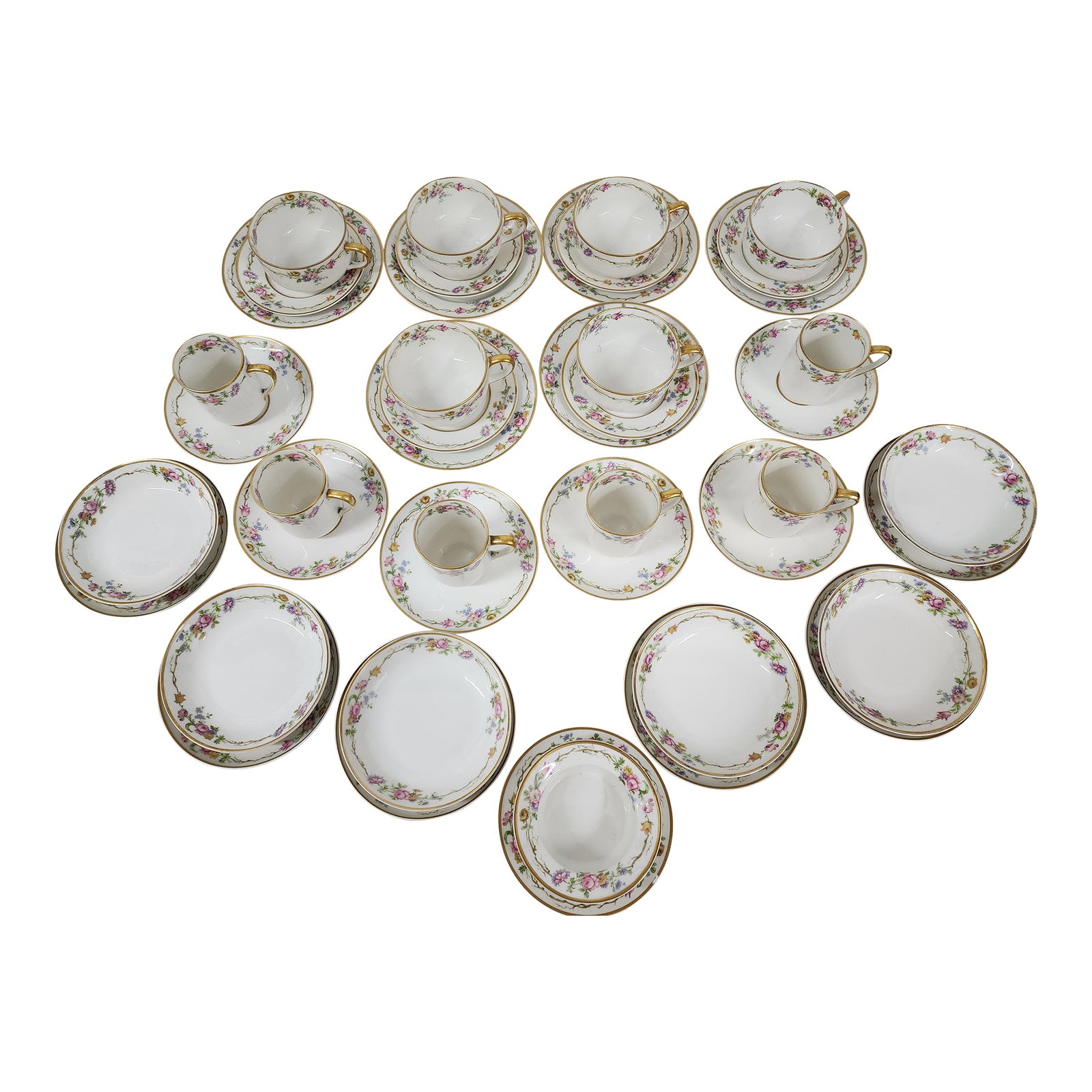 1950s Limoges Tea and Coffee Set. c.h. Field Haviland - 44 Pieces: Beautiful set in remarkable condition. It includes 6 small bowls with saucers, 6 teacups and saucers and 6 espresso cups Only found one chip on one saucer. Condition: Alterations: Original Condition U