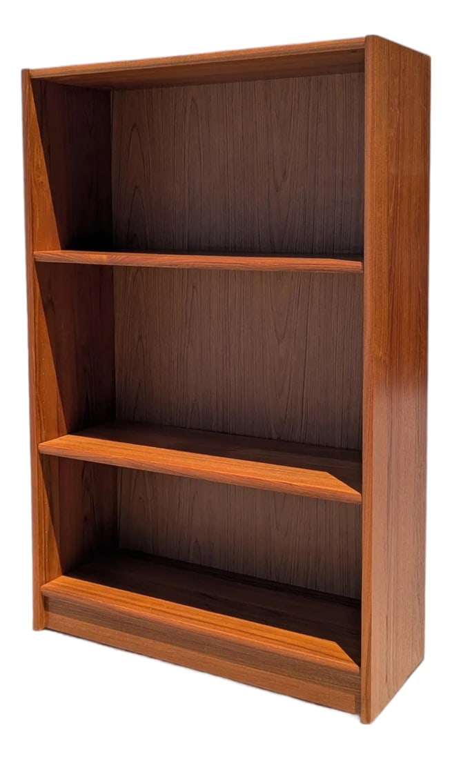 Petite Vintage Teak Bookcase, Danish Modern, 1970s: A petite vintage teak bookcase with warm grain, clean lines, and open shelving. Its shallow depth and compact scale make it especially useful for books, ceramics, records, or collected objects in smal