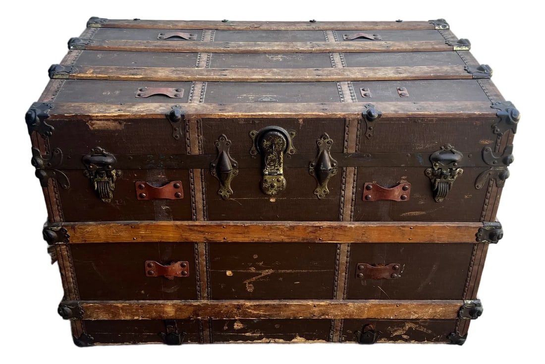 Antique C. W. Weeks Steamer Trunk With Original Key, Circa 1910: A beautiful early 20th-century flat-top travel trunk distributed by the C.W. Weeks Co. of Springfield, Massachusetts. This piece features a highly desirable flat top profile, making it the perfect cho