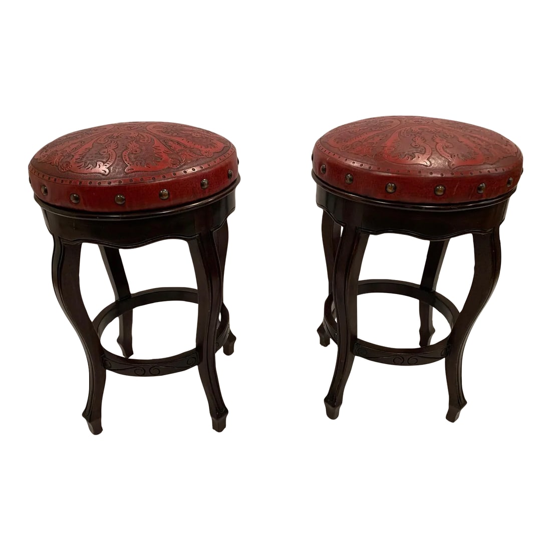 Italian Embossed Leather and Wood Bar Stools -A Pair: Rich Italian embossed leather bar stools in a marvelous orange red color, having large copper nail heads embellishing the periphery. Solid walnut bases. Condition: Alterations: Original Condition Unal