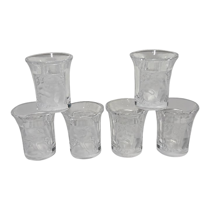 Set of Six (6) Lalique 'Enfants' Crystal Liqueur Shot Glasses, France Signed: A fine set of six Lalique France crystal liqueur or shot glasses in the celebrated Enfants pattern, originally designed by Rene Lalique in 1932. Each small vessel is formed in clear molded crystal