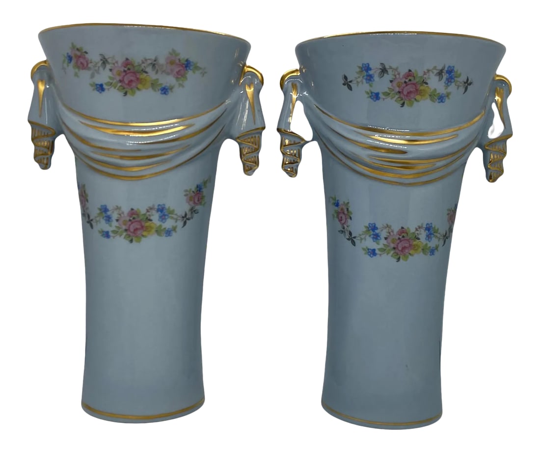 Mid 20th Century Baby Blue Ceramic Vases With Gold Trim and Floral Design - a Pair: Stunning Pair of Mid 20th Century Baby Blue Ceramic Vases With Gold Trim and Floral Design. Each Vase has gold drapery surrounding the body. Each Vase has P-133 impressed in the bottom of the base.