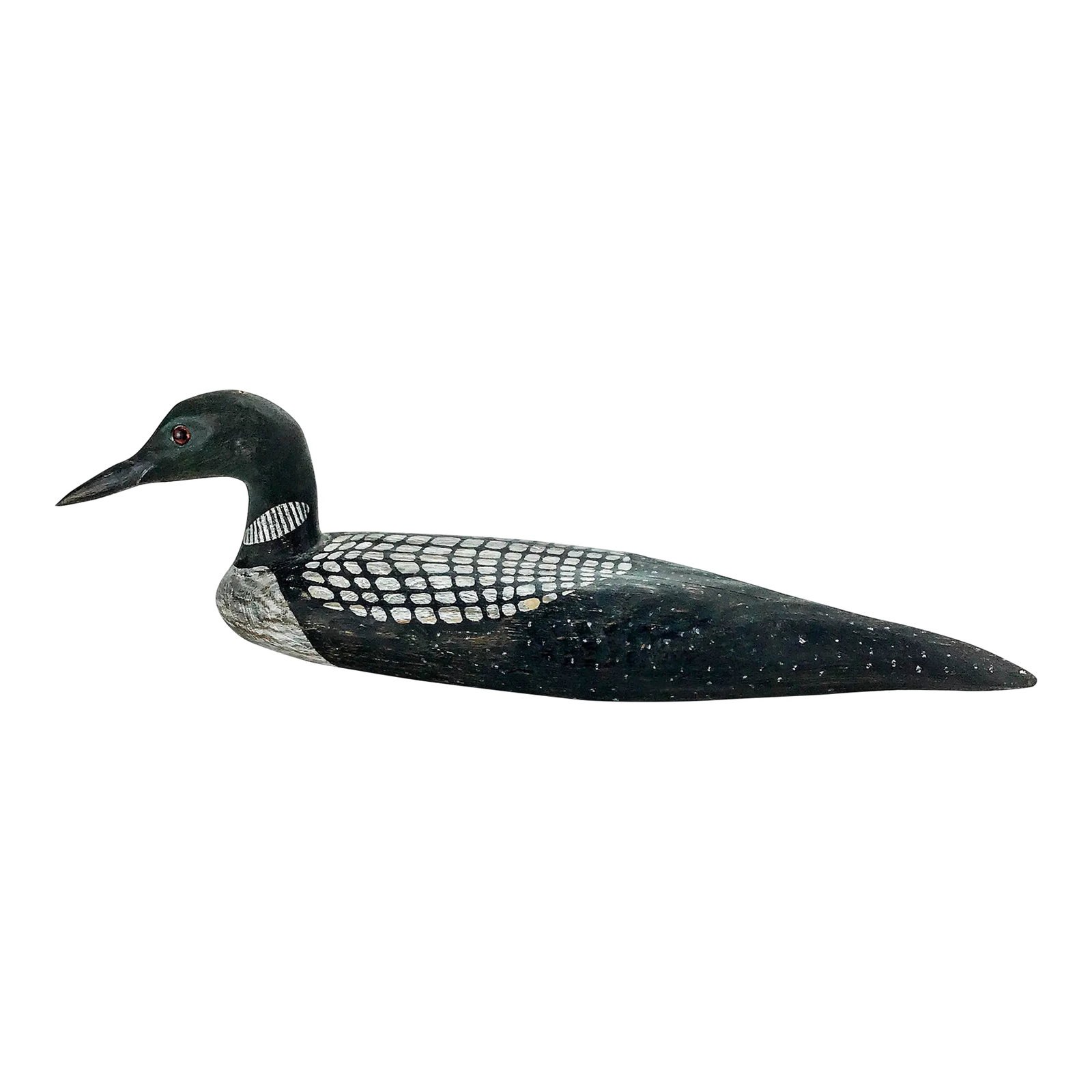 Folk Art Hand Carved Wood Decoy Loon Statue: Duck Statue carved from wood and hand painted. Signed at the bottom by the artist. In wonderful vintage condition and ready to display inside or out. Red glass eyes create a lifelike appearance. Condi