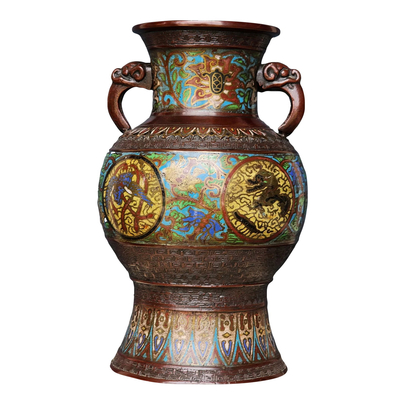 Early 20th Century Japanese Champleve Cloisonne Enamel Vase: Extra Large and heavy Japanese champleve enameled and etched bronze lamp base from a repurposed vase. The bottom of the vase has been removed but displays well as a vase when placed on a stand or