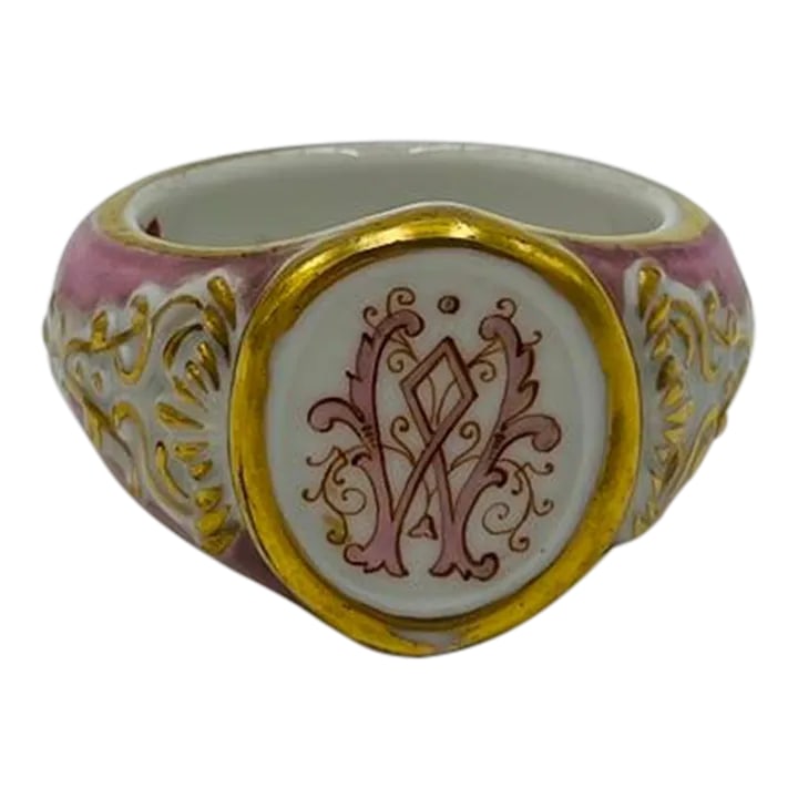 Unique Antique Old Paris Porcelain "w" Napkin Ring: An antique 19th century old paris porcelain napkin ring. Finely decorated with a "W" monogram to center of face, acanthus gilt accents and a pink body. Unmarked. Condition: Alterations: Original Condi