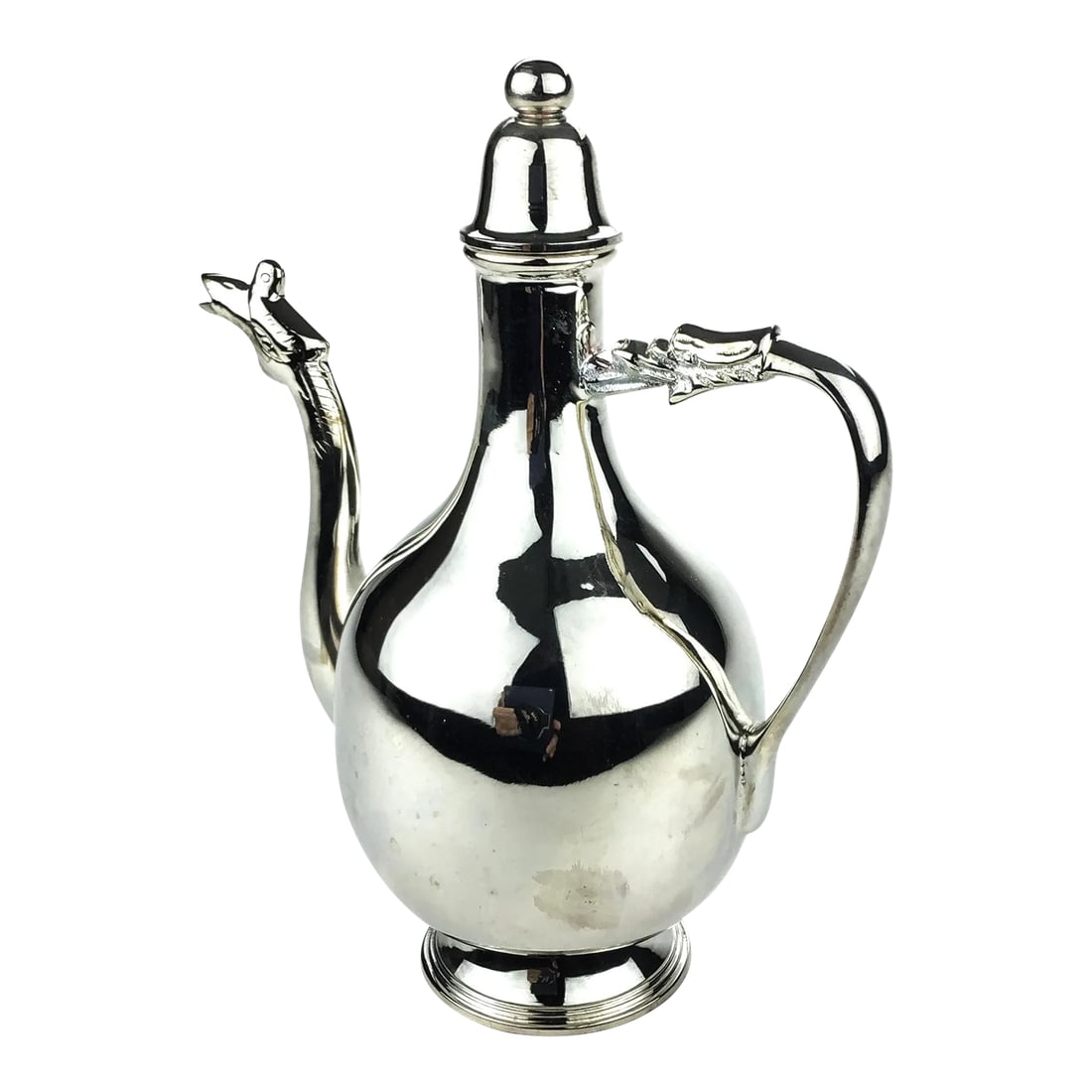 Silverplated Dragon Wine Vinegar Tea Decanter: Heavy yet stable as new condition silver plate carafe. Comes with a lid which is removable. The dragon is part of the handle and we also find the traditional phoenix shaped mouth for pouring the conte