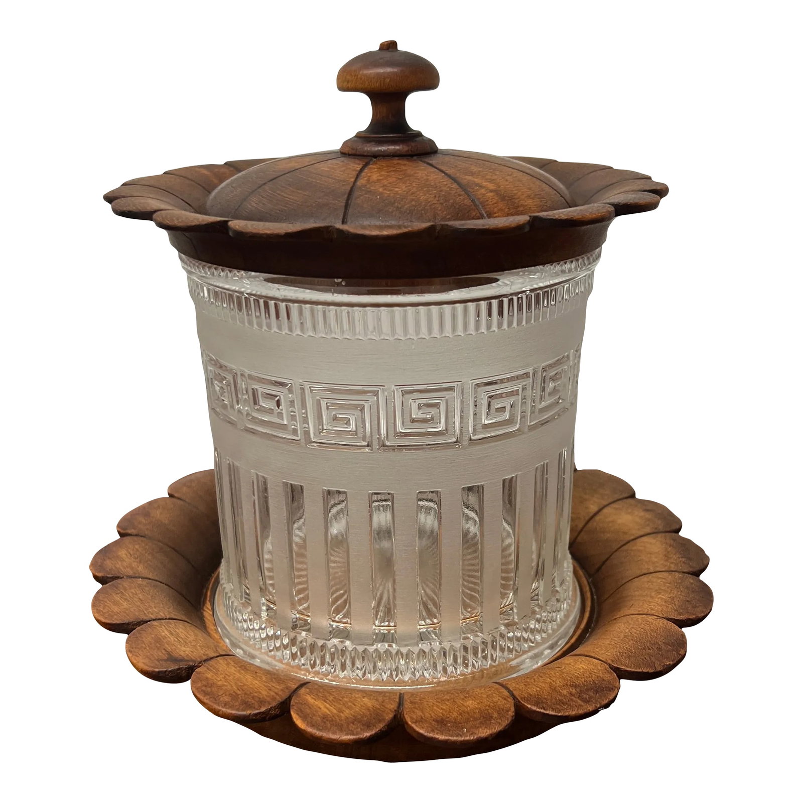 English Pressed Glass & Carved Oak Greek Key Motif Biscuit Barrel or Humidor: English, circa 1867. An unusual antique biscuit barrel or humidor. The main body is formed of pressed glass with a greek key border, paneled window and a reeded edge. The glass rests inside a lotus fo