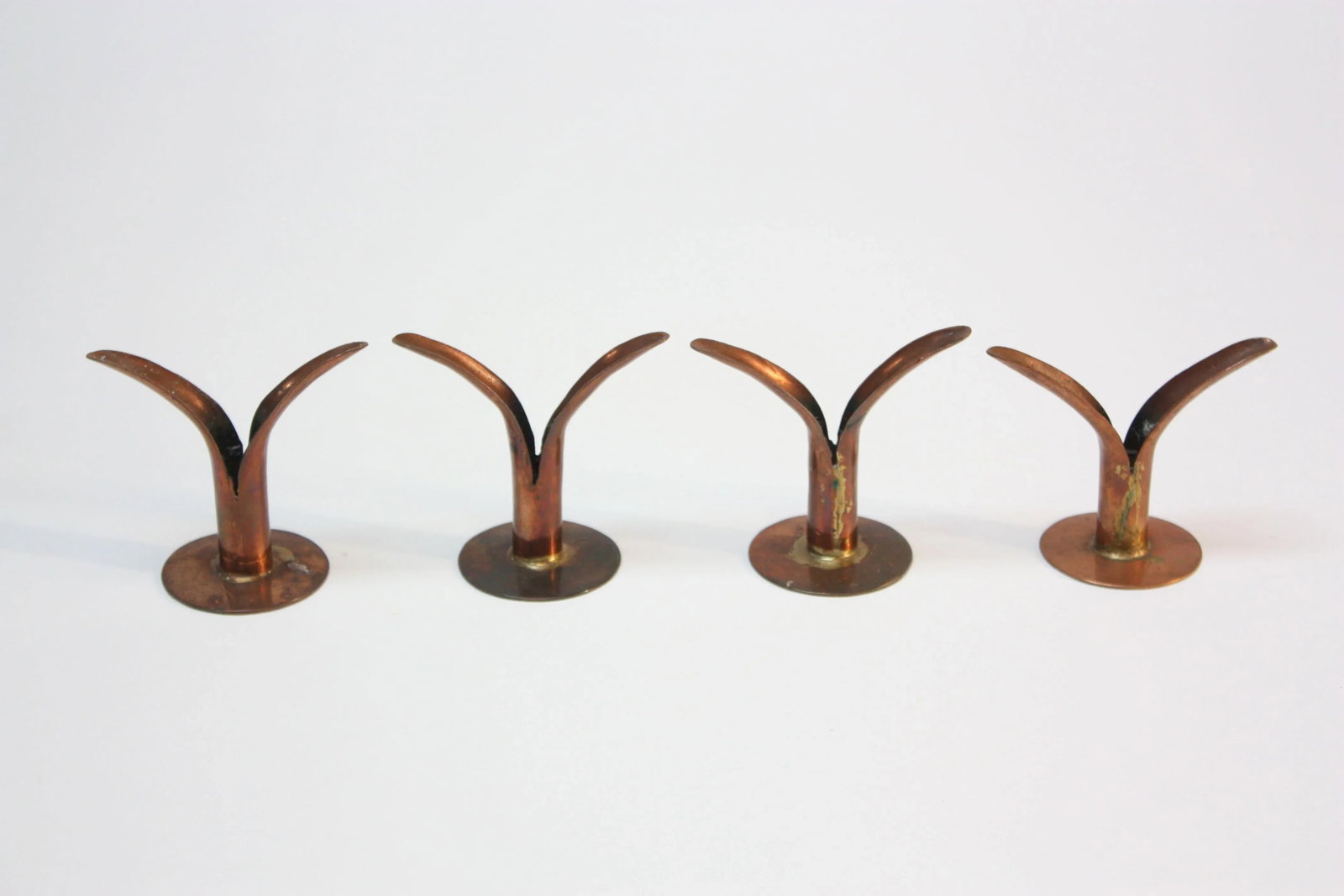 Set of Four Small Copper Ystad Candleholders - 4