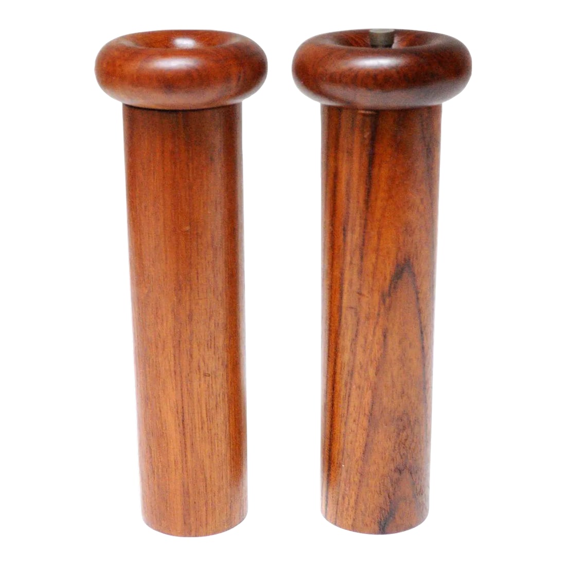Sculptural Danish Modern Teakwood Salt Shaker and Pepper Grinder Set: Mid-Century Modern teak pepper grinder and salt shaker set (ca. 1960s, Denmark). Sculptural, modernist form with cylindrical bases topped with dense, donut-form rings. Exquisite teak grain and rich co