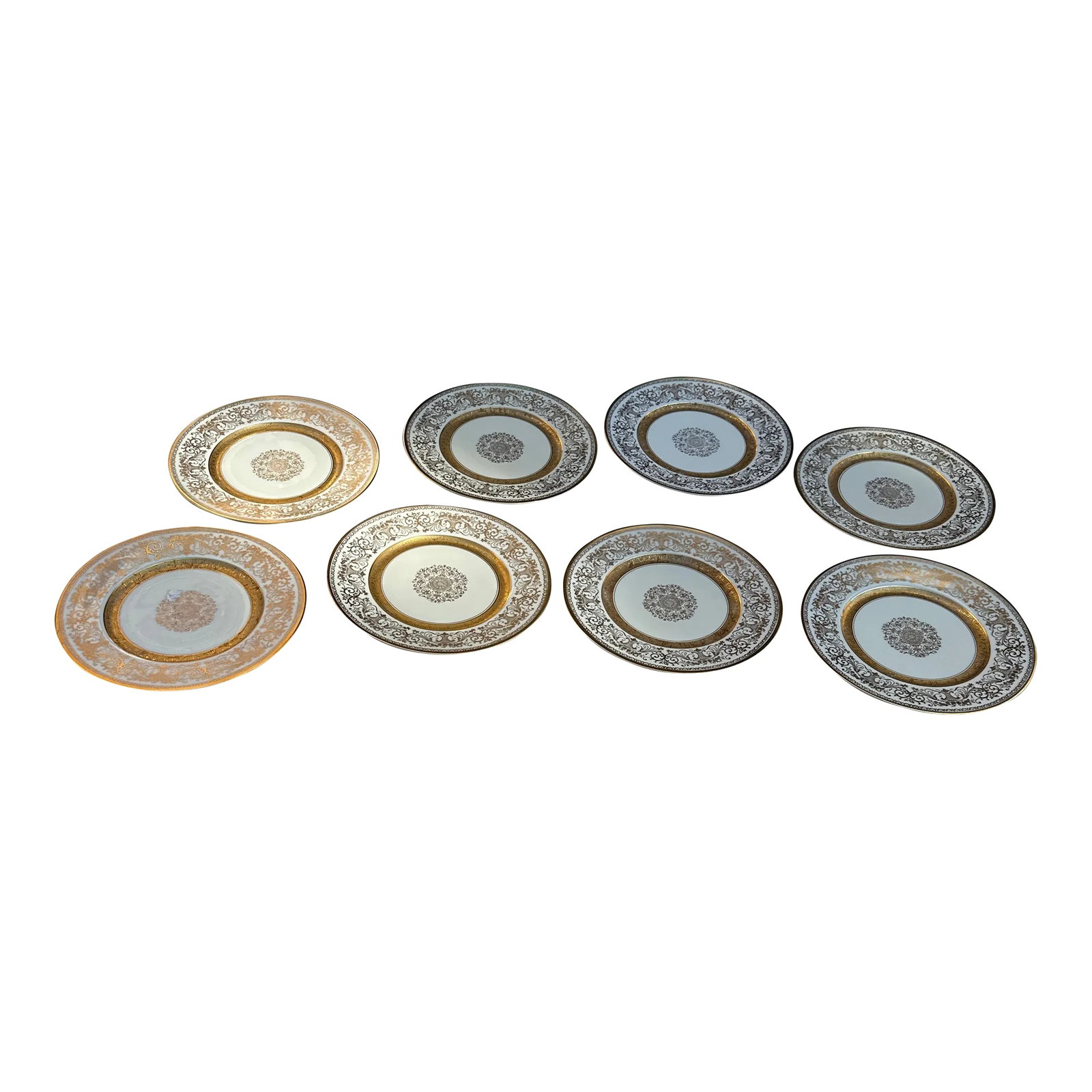 1970s Collection of Gold Detailed Dinner Plates- Set of 8: Up for consideration is a beautiful set of gold detailed dinner plates. These would look perfect at your next dinner party or displayed in your home. This set is great for the interior design